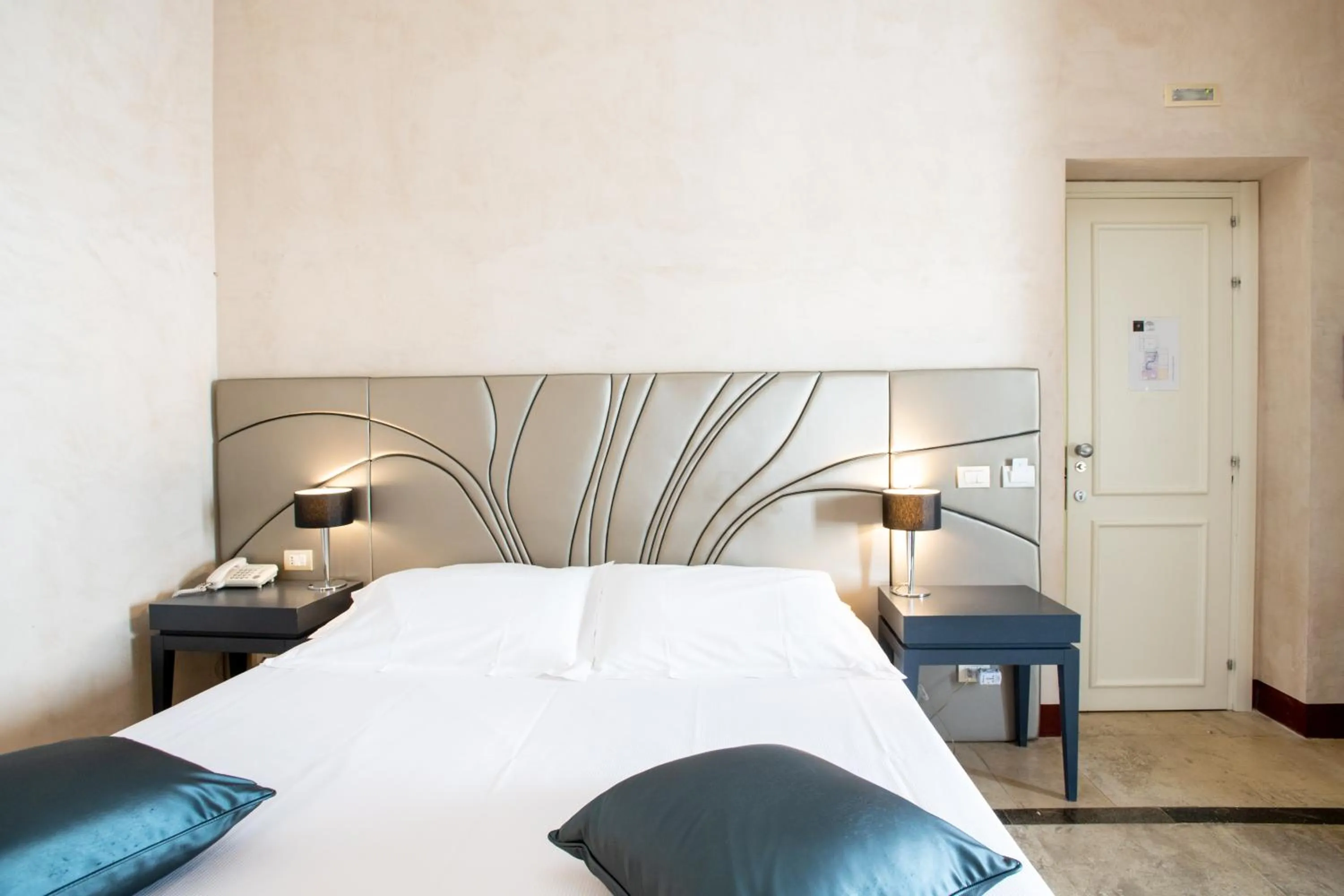 Bed in De Stefano Palace Luxury Hotel