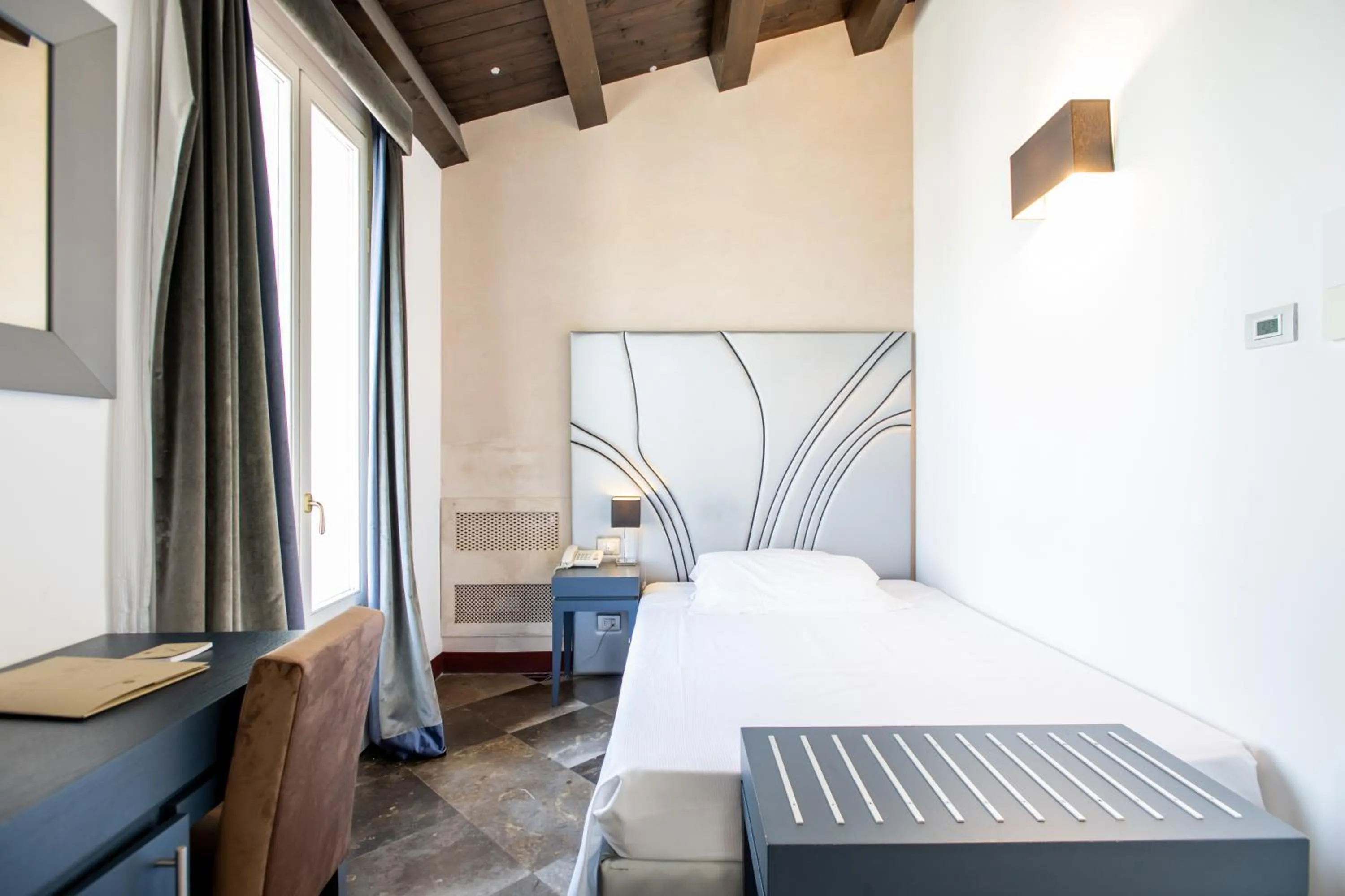 Bed in De Stefano Palace Luxury Hotel