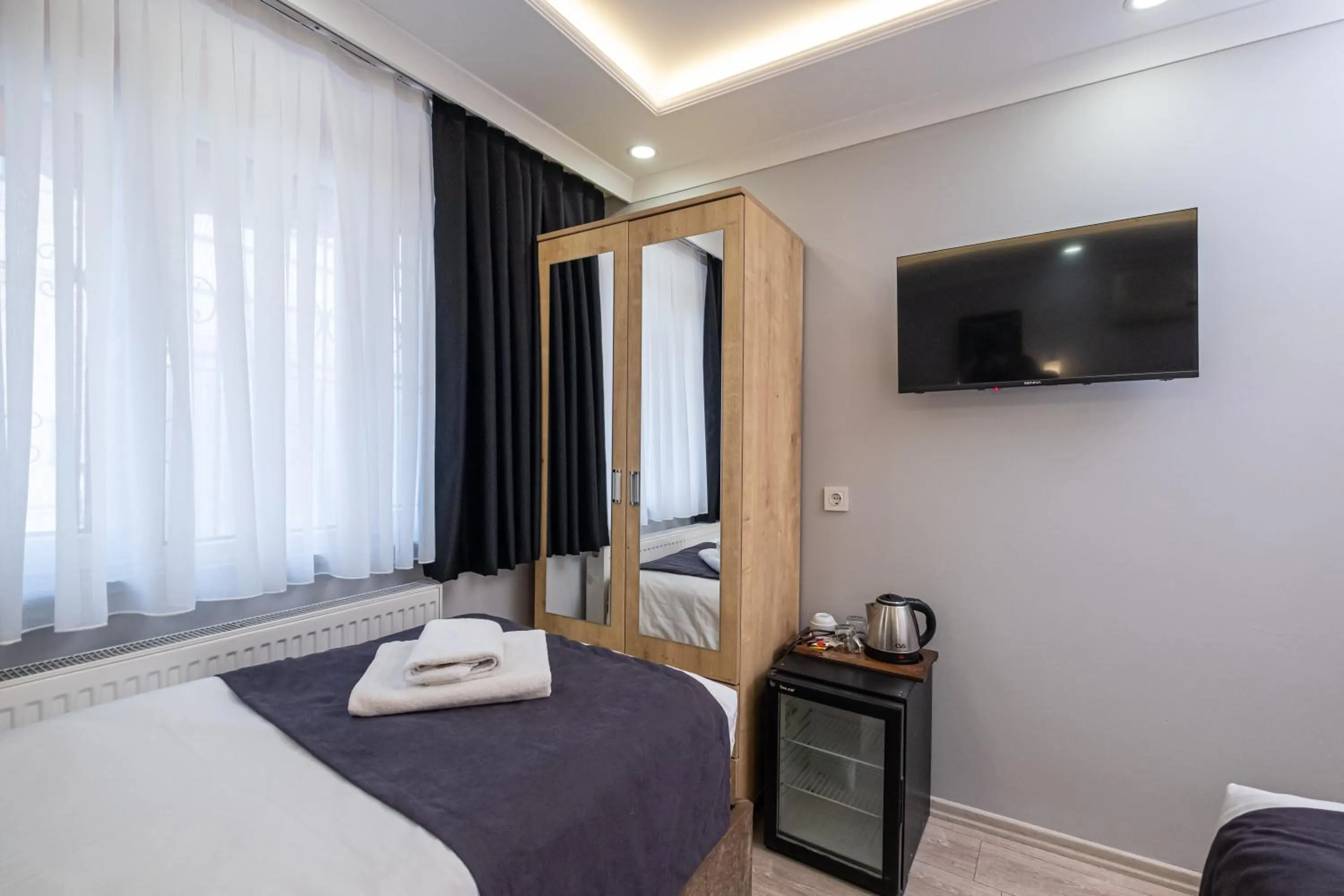 Bed in Family Istanbul Hotel