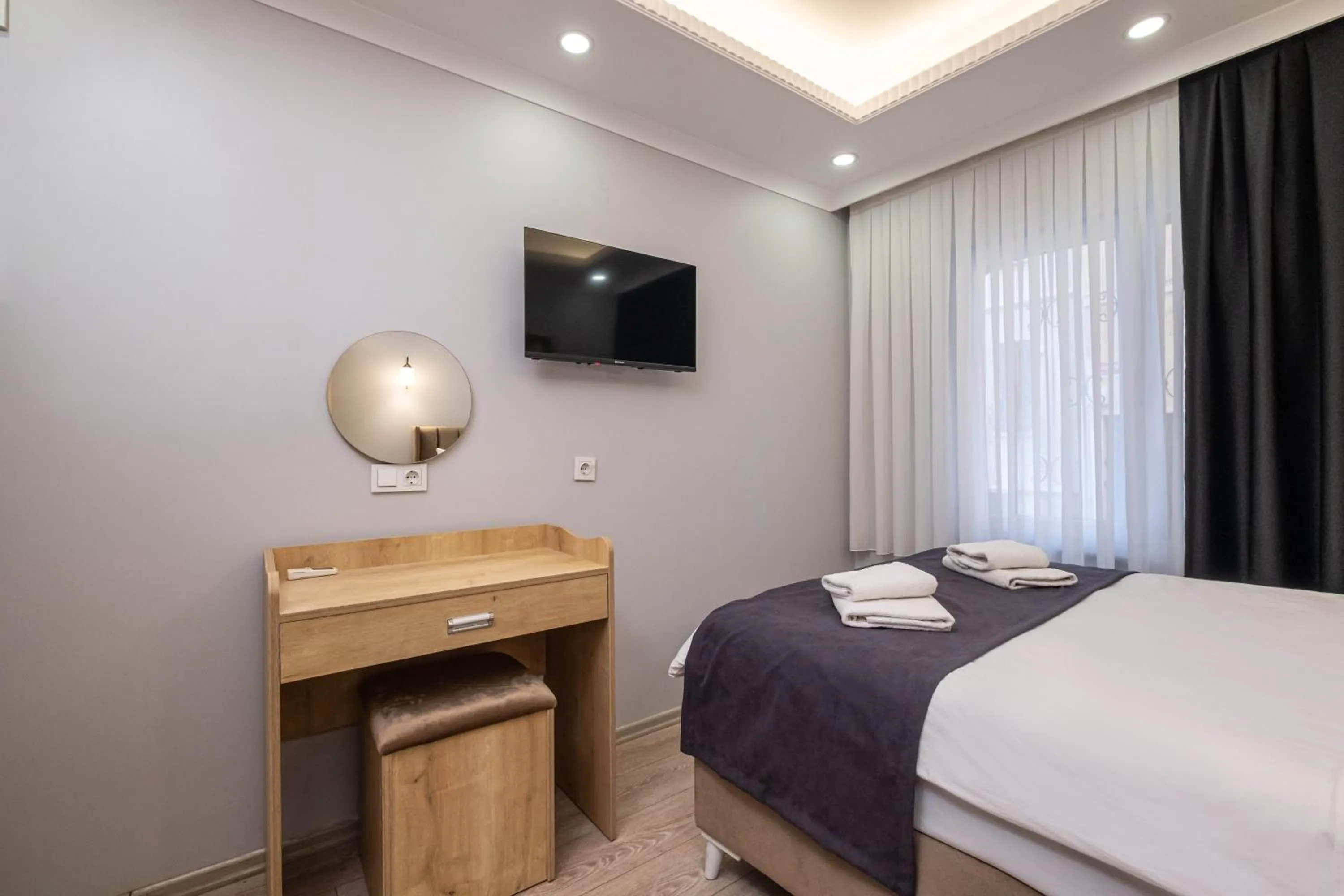 Bed in Family Istanbul Hotel