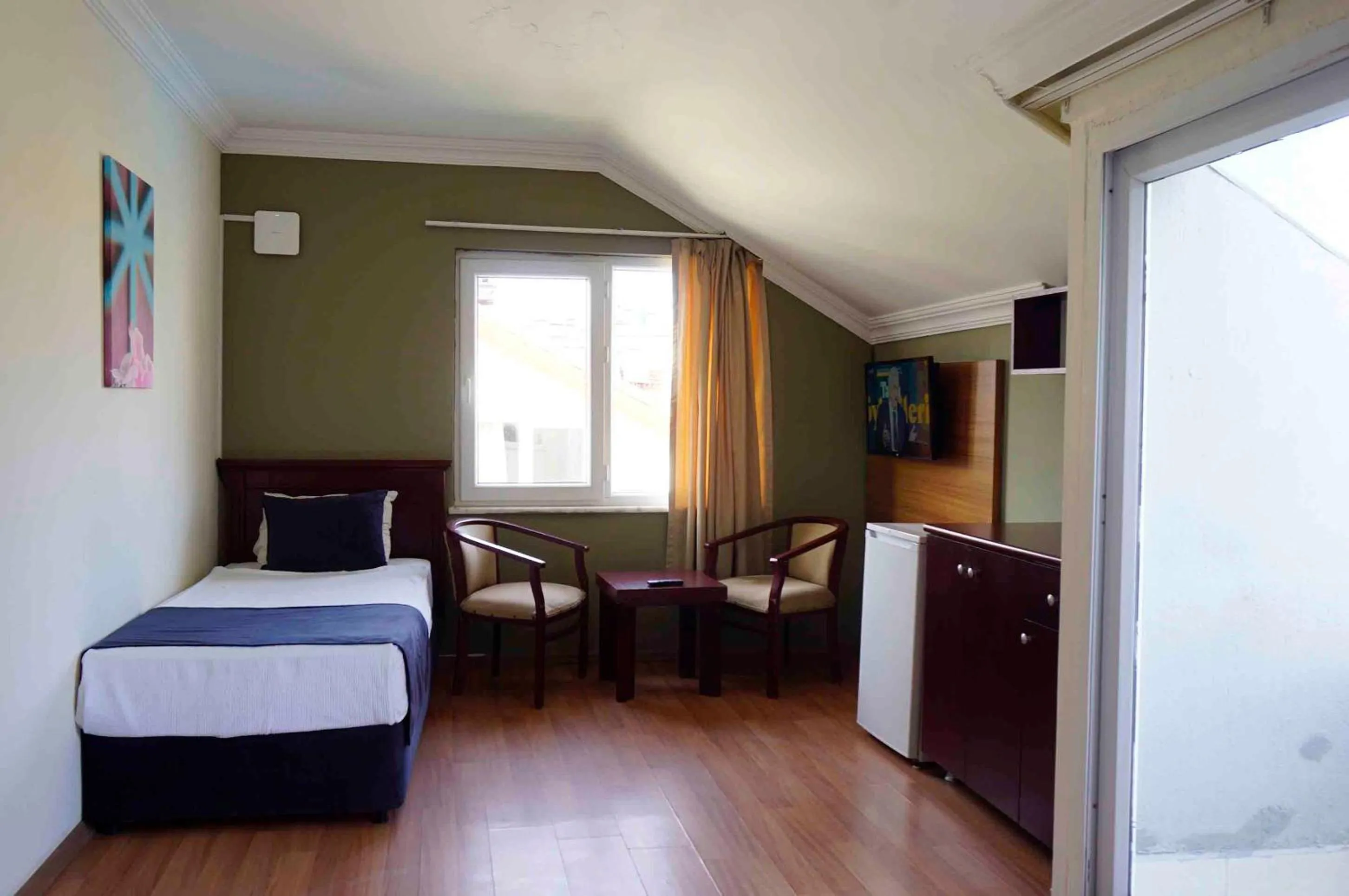 Bed in Sunlight Garden Hotel