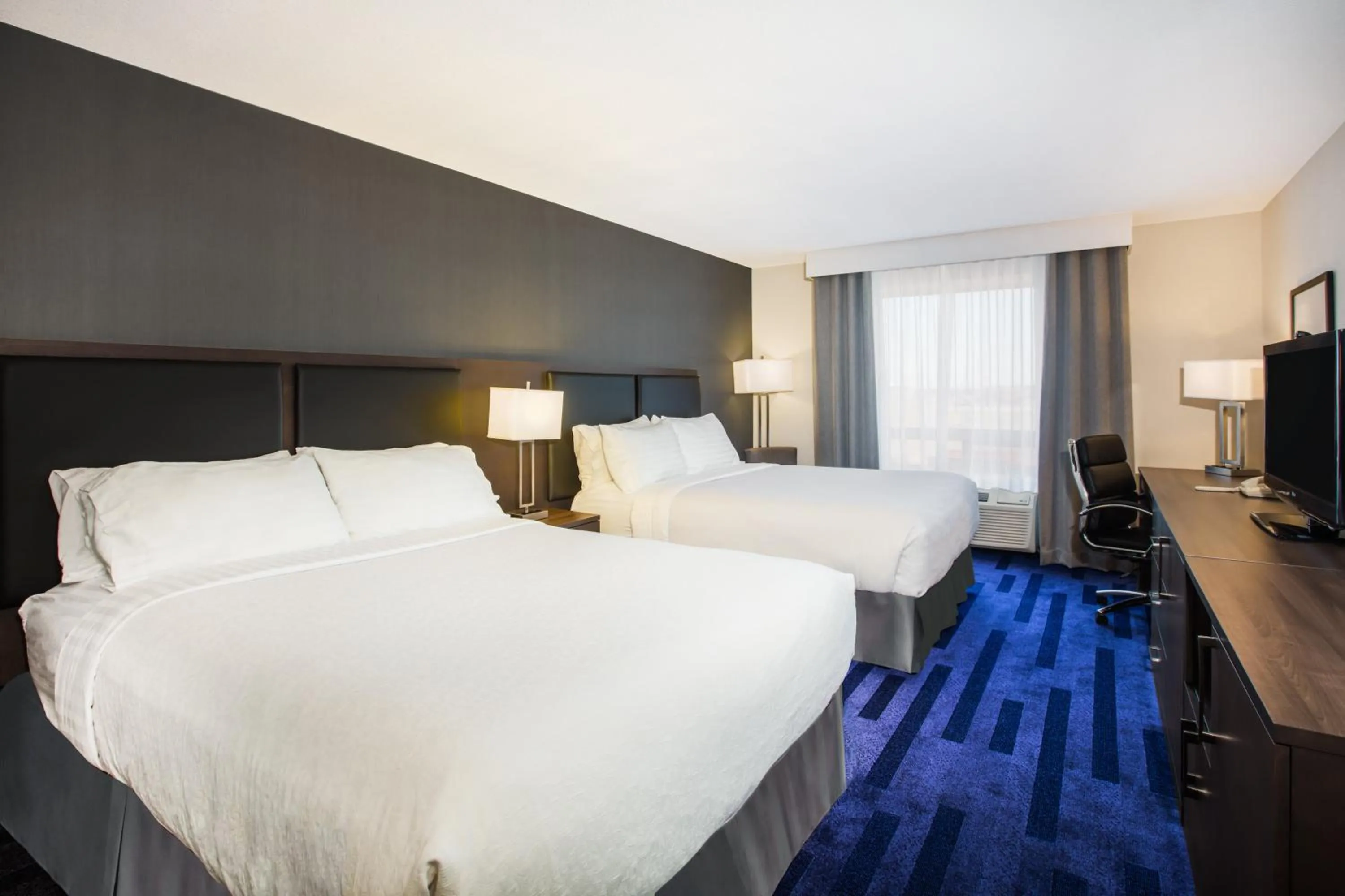 Photo of the whole room, Bed in Holiday Inn & Suites Grande Prairie by IHG