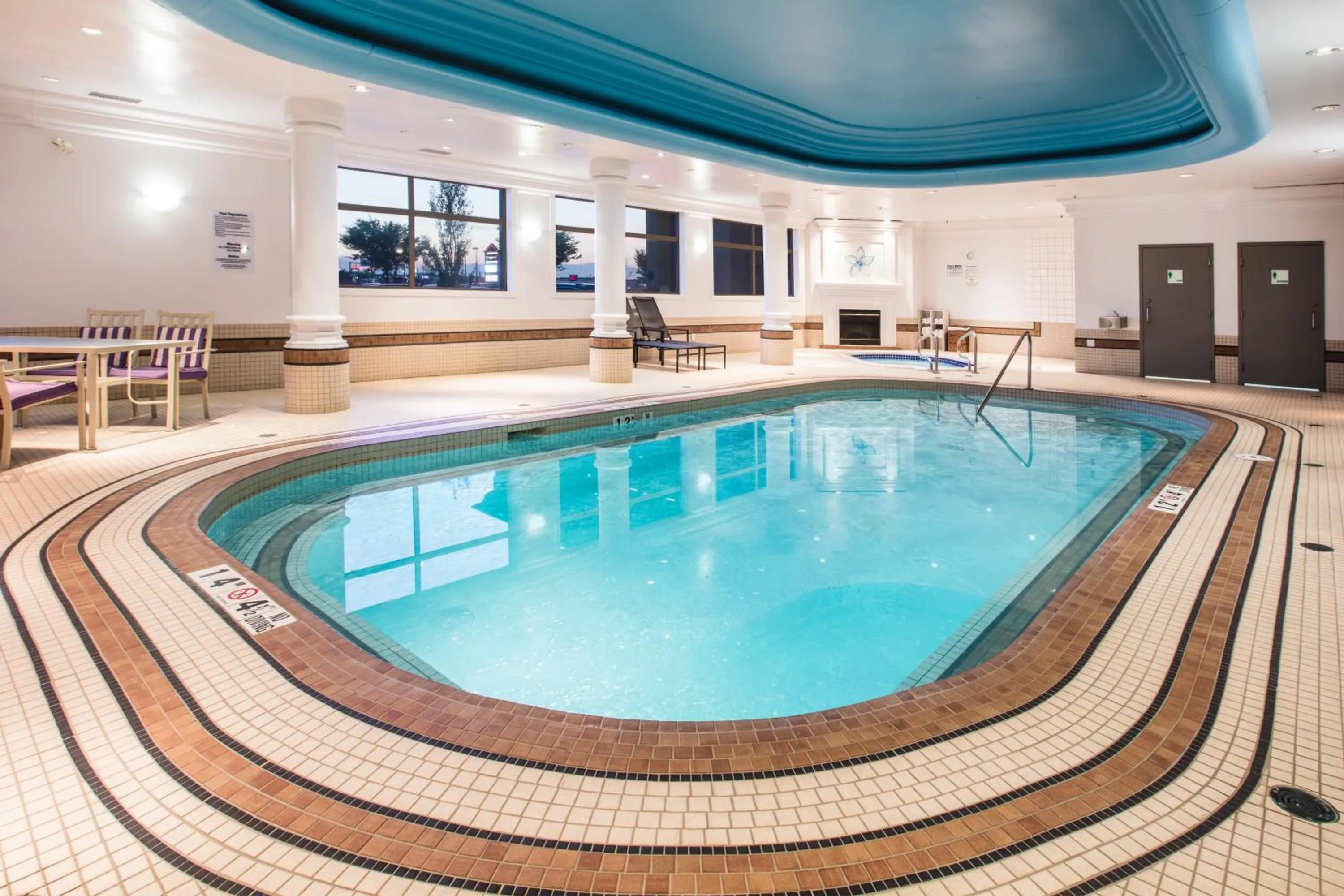 Swimming pool in Holiday Inn & Suites Grande Prairie by IHG