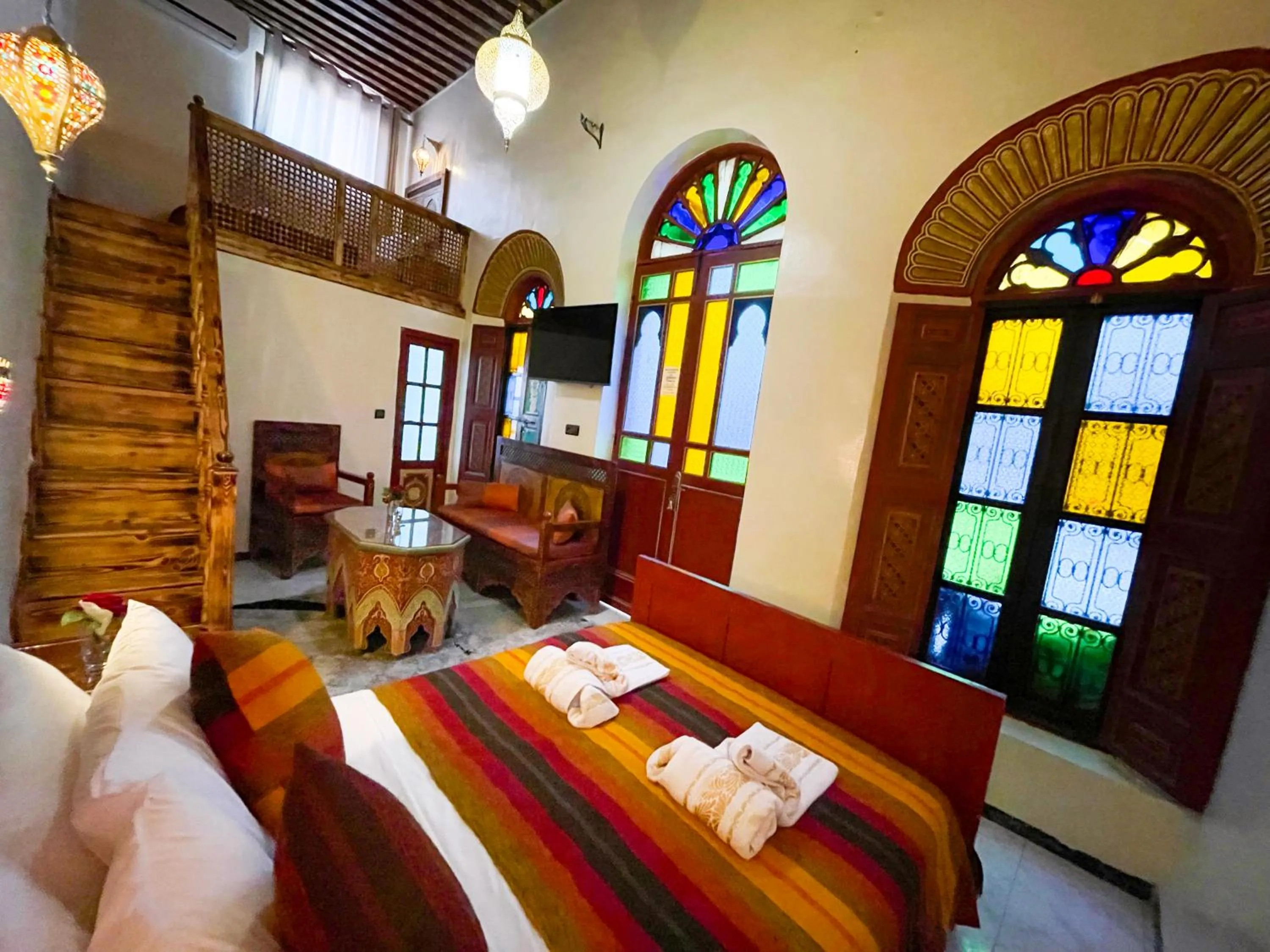 Bed in Riad Dar El Ouedghiri