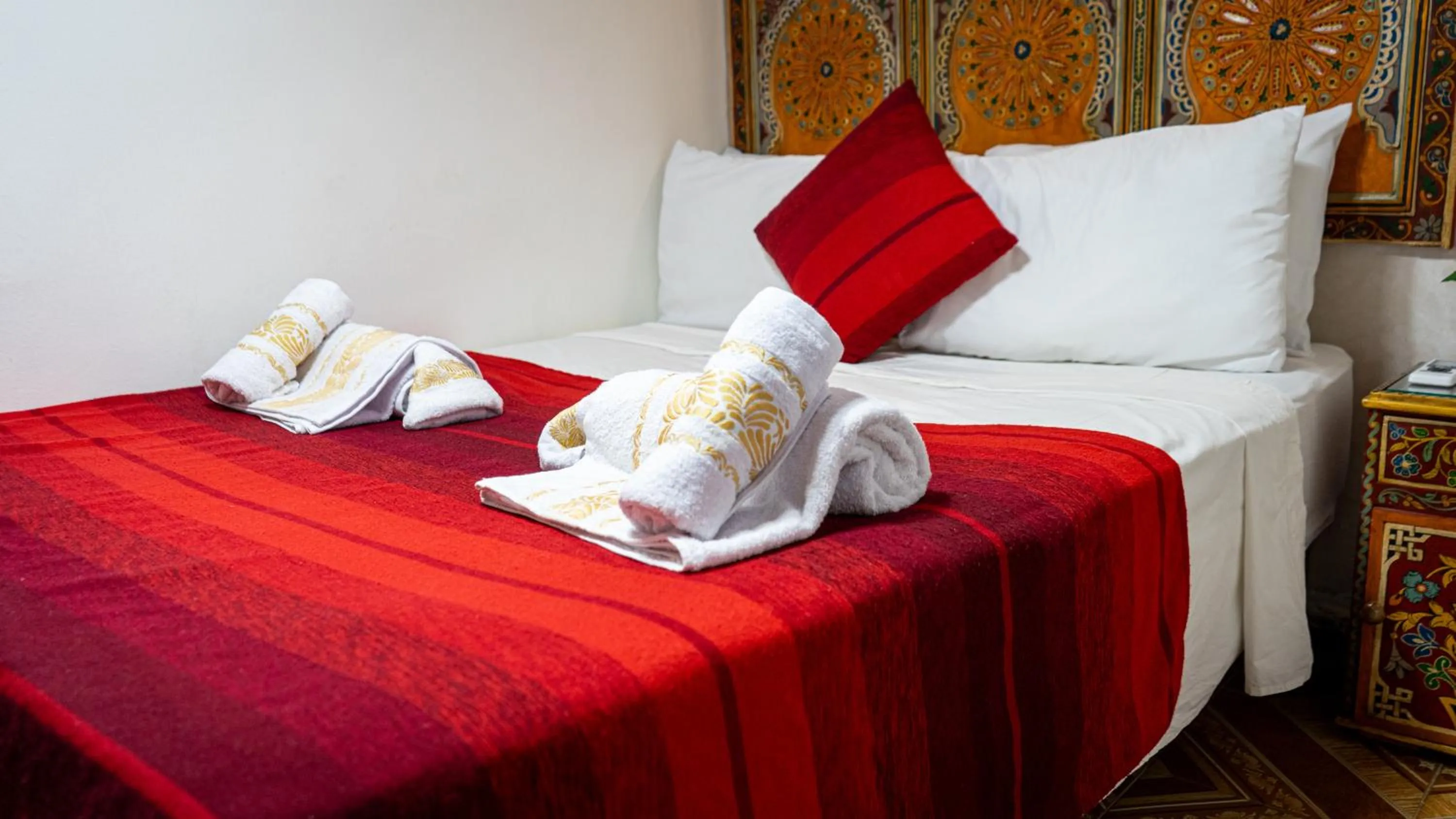 Bed in Riad Dar El Ouedghiri