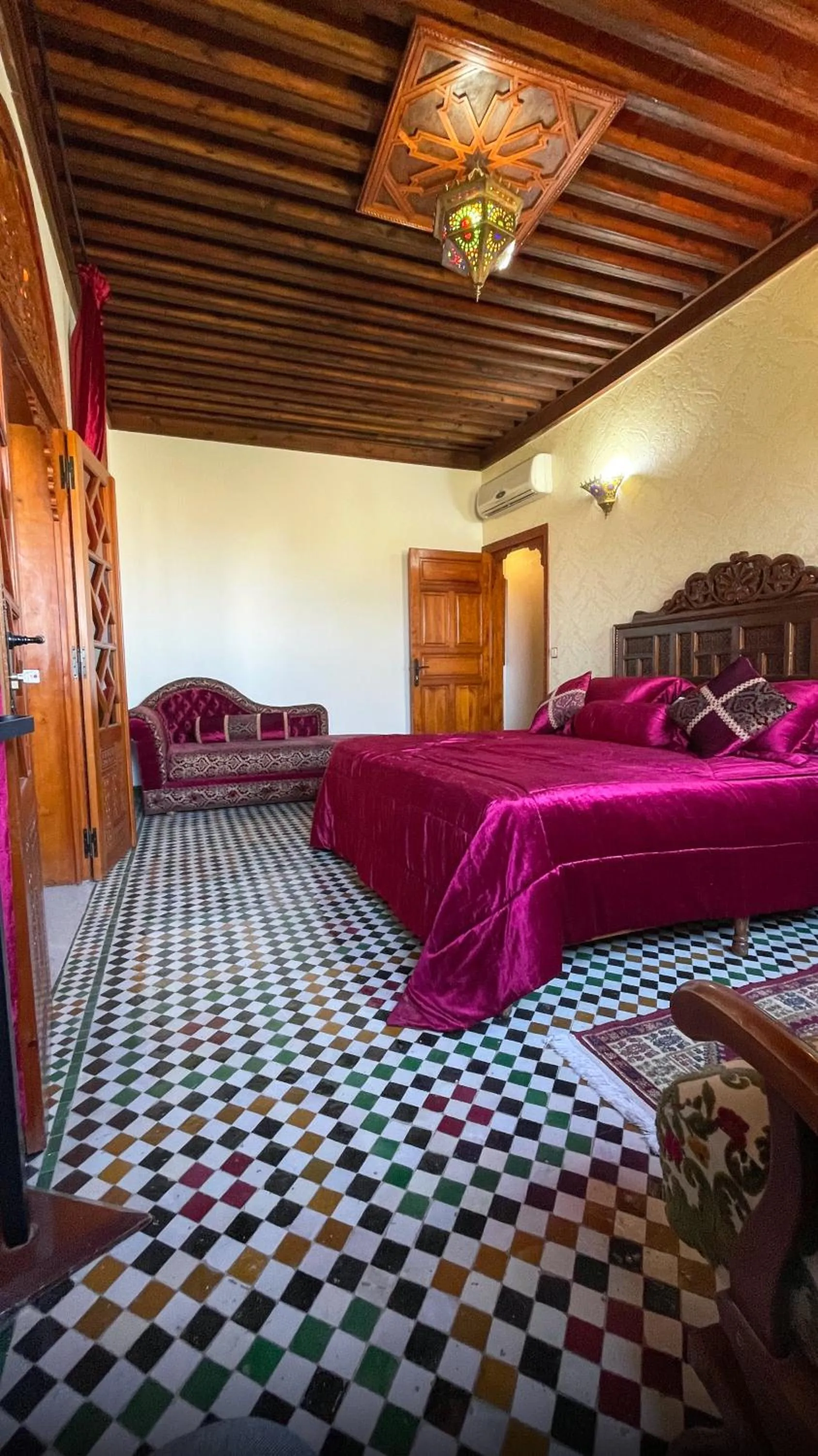 Bed in Riad Dar El Ouedghiri