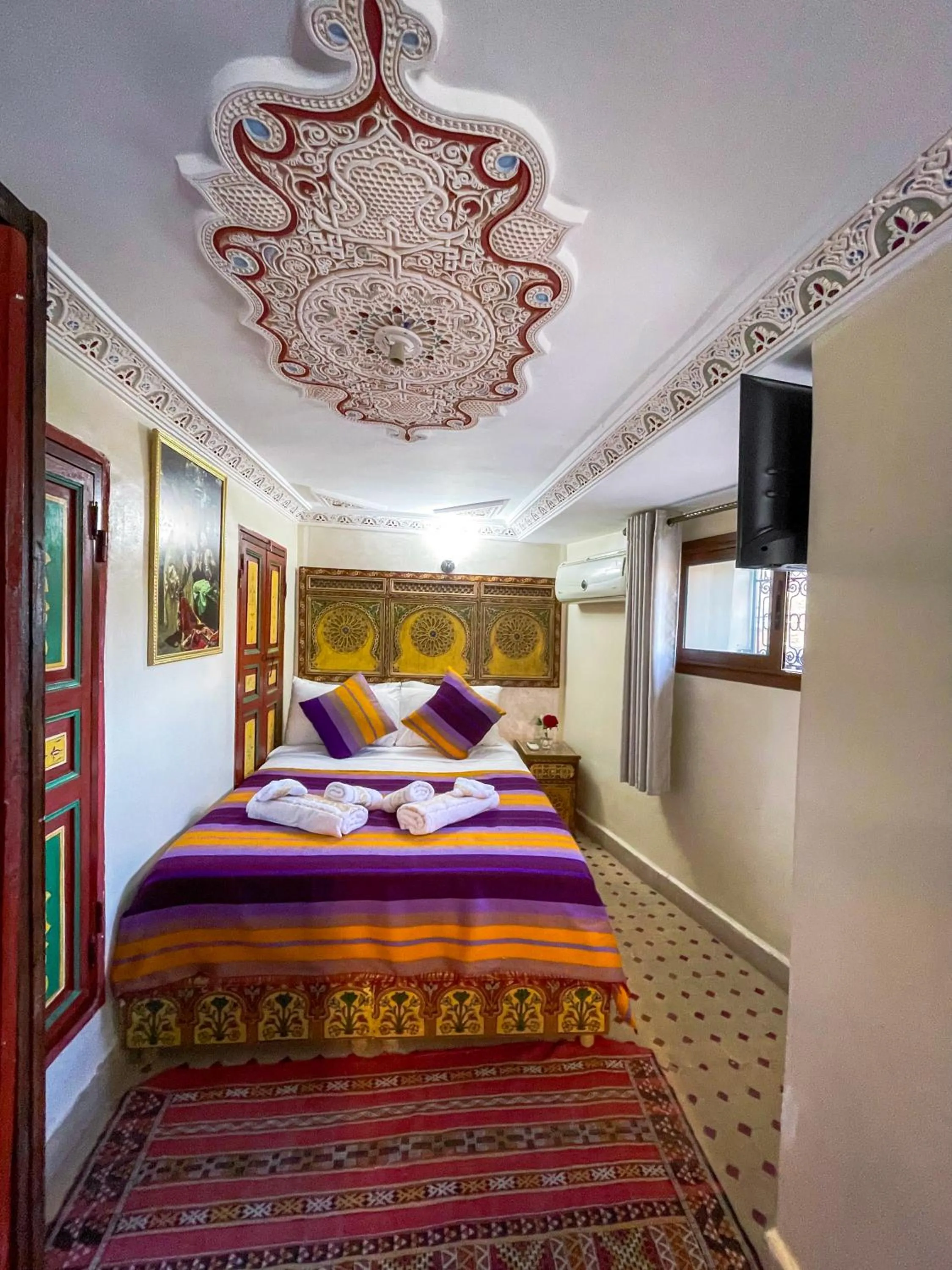 Communal lounge/ TV room, Bed in Riad Dar El Ouedghiri