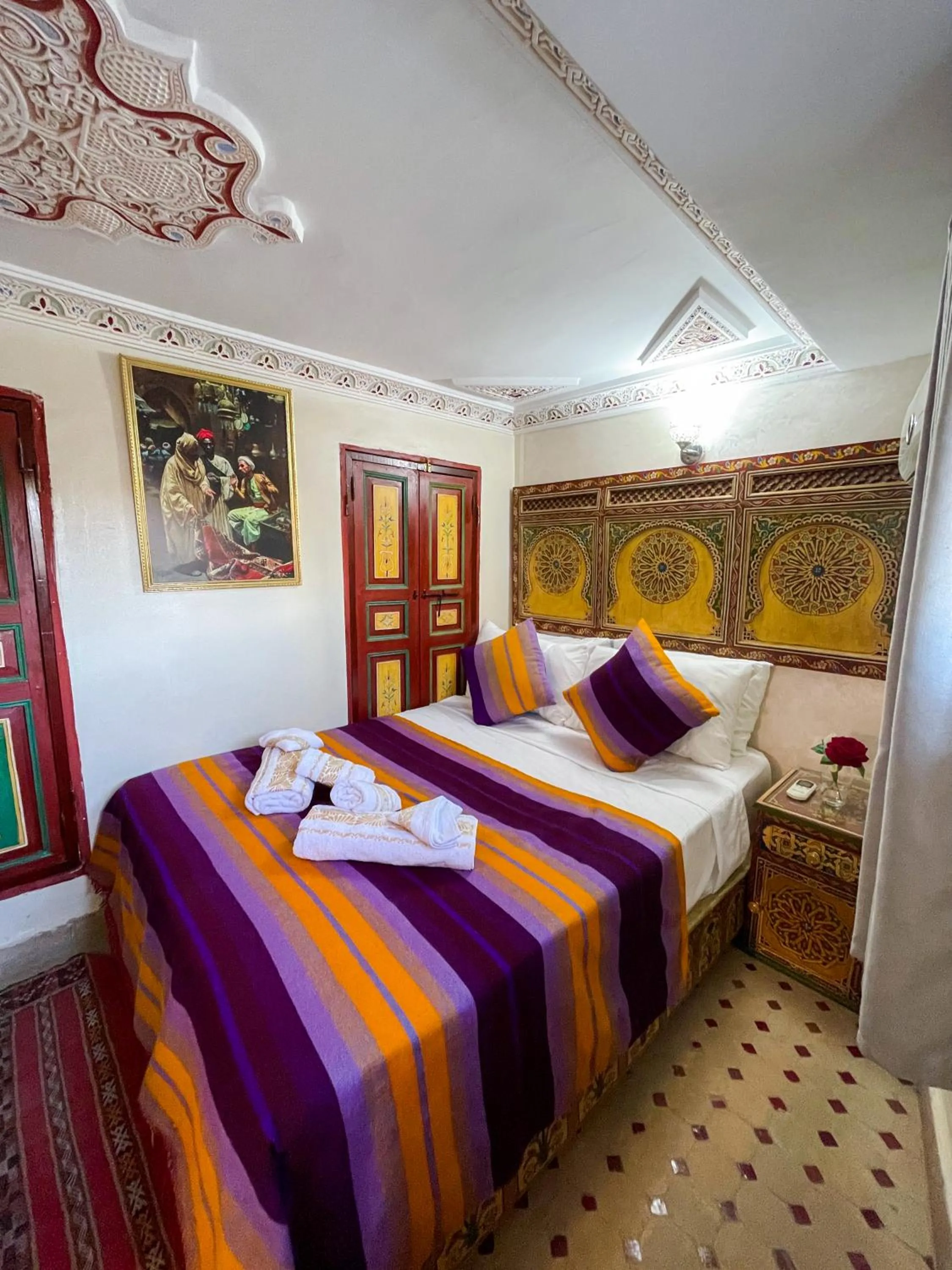 Bed in Riad Dar El Ouedghiri