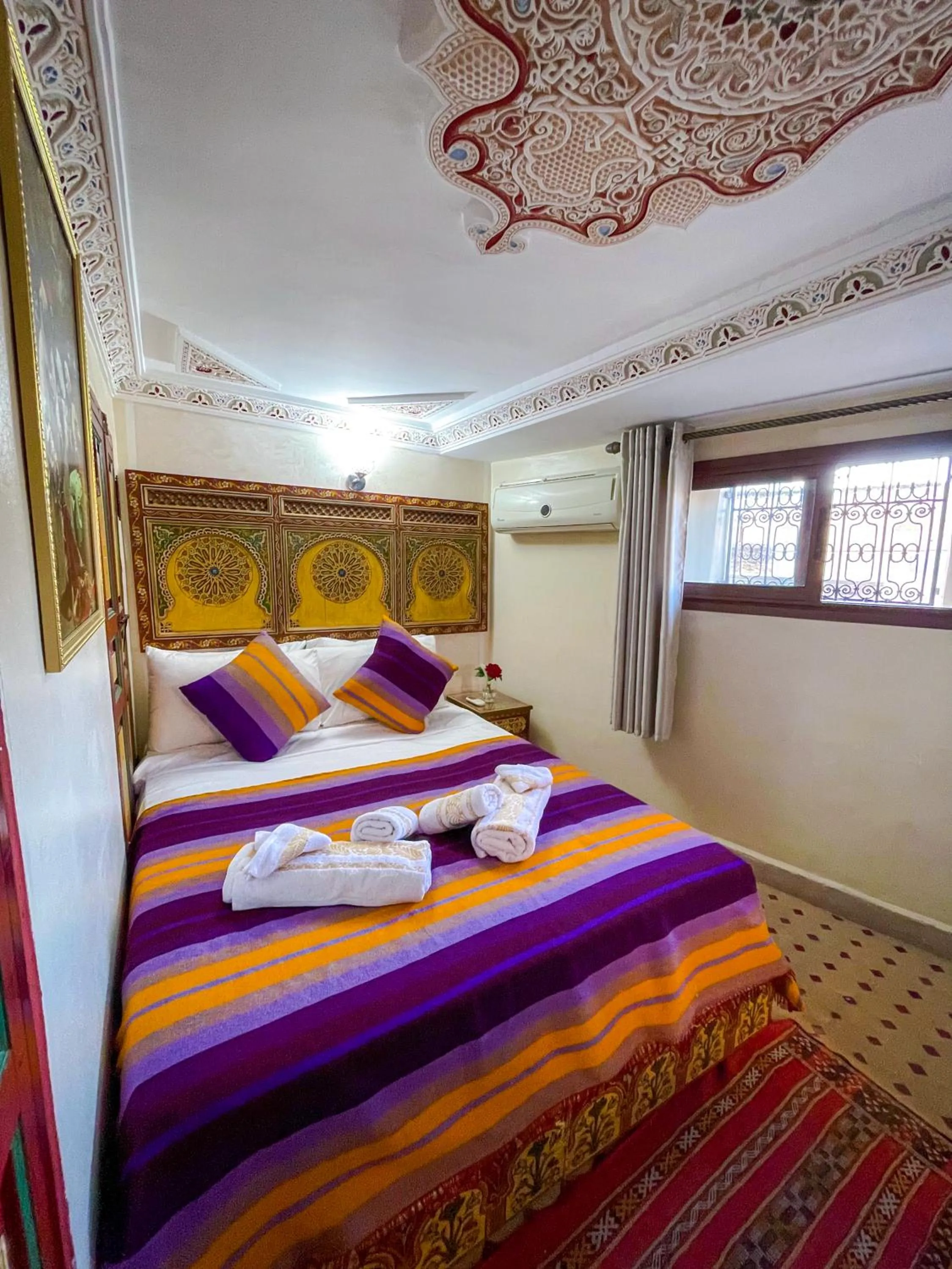 Bed in Riad Dar El Ouedghiri