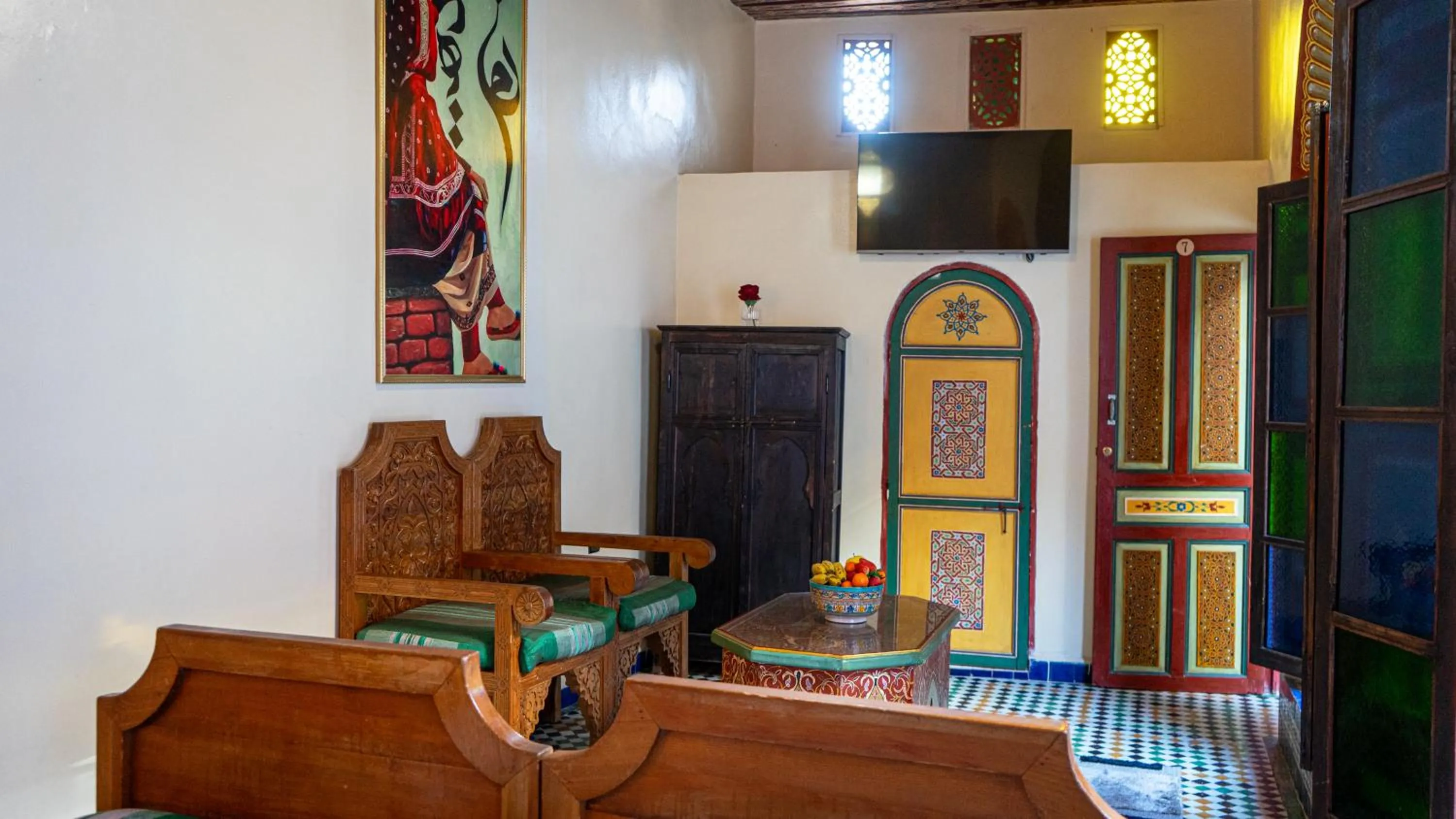 Communal lounge/ TV room in Riad Dar El Ouedghiri