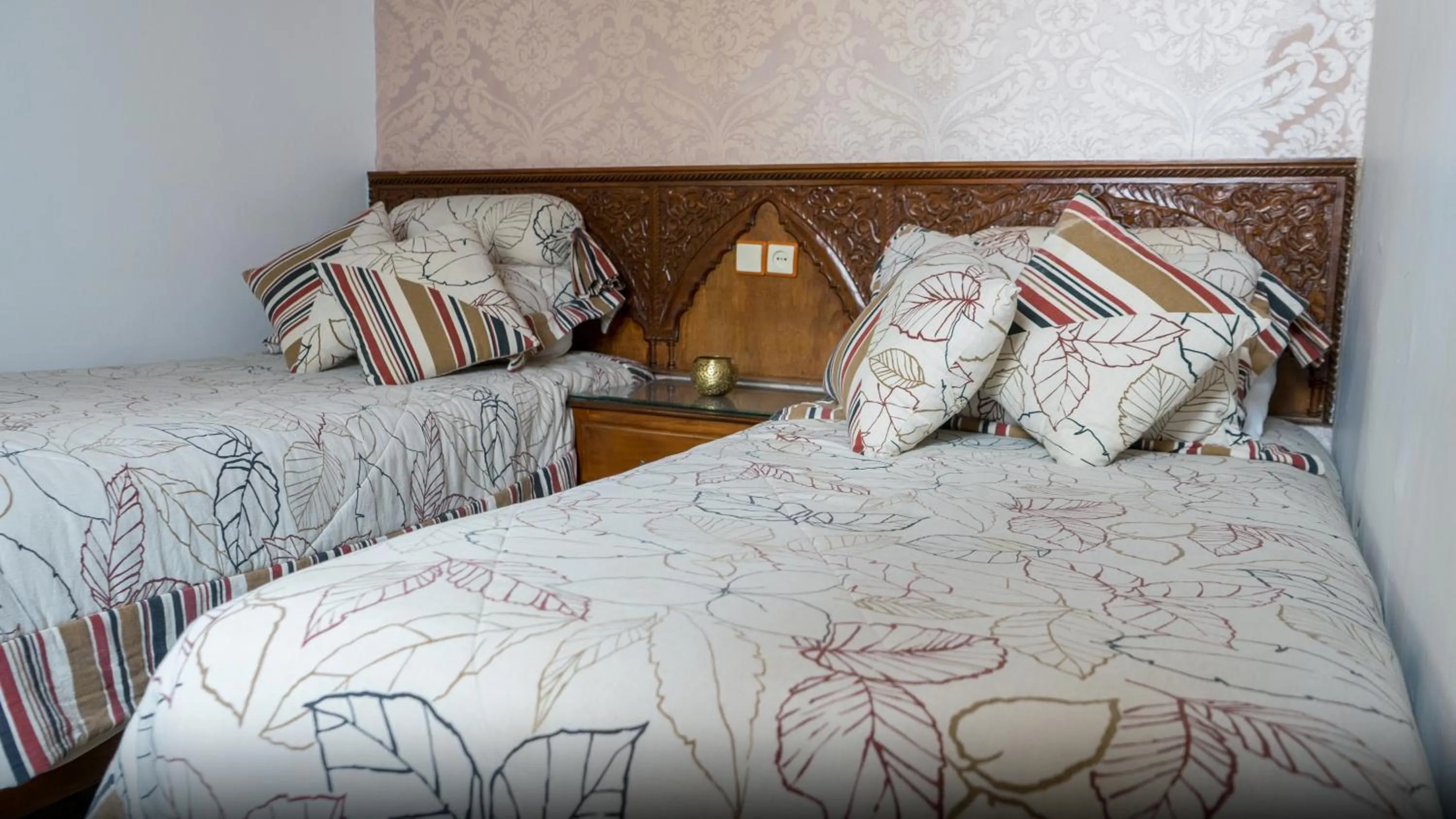 Bed in Riad Dar El Ouedghiri