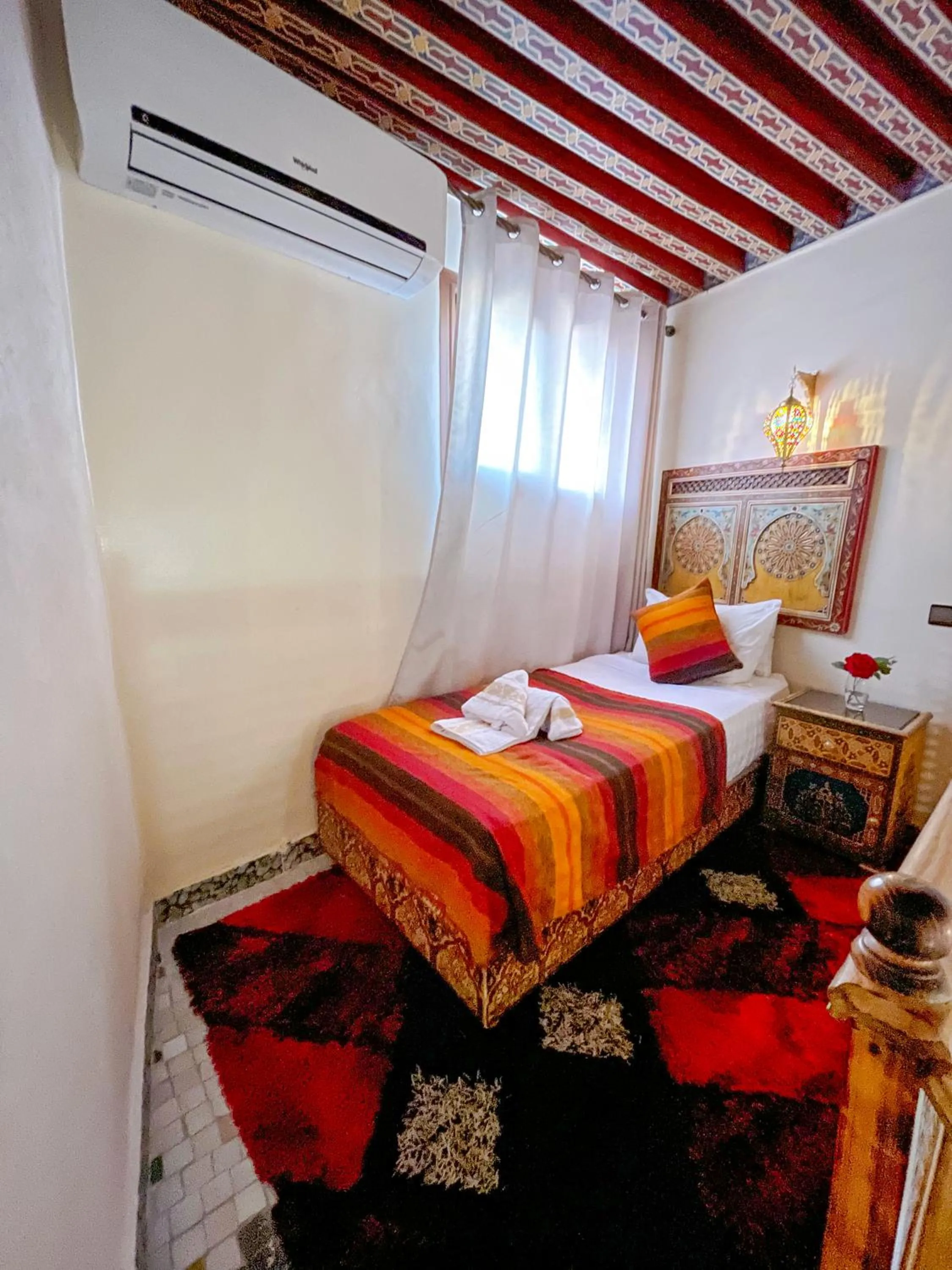 Bed in Riad Dar El Ouedghiri