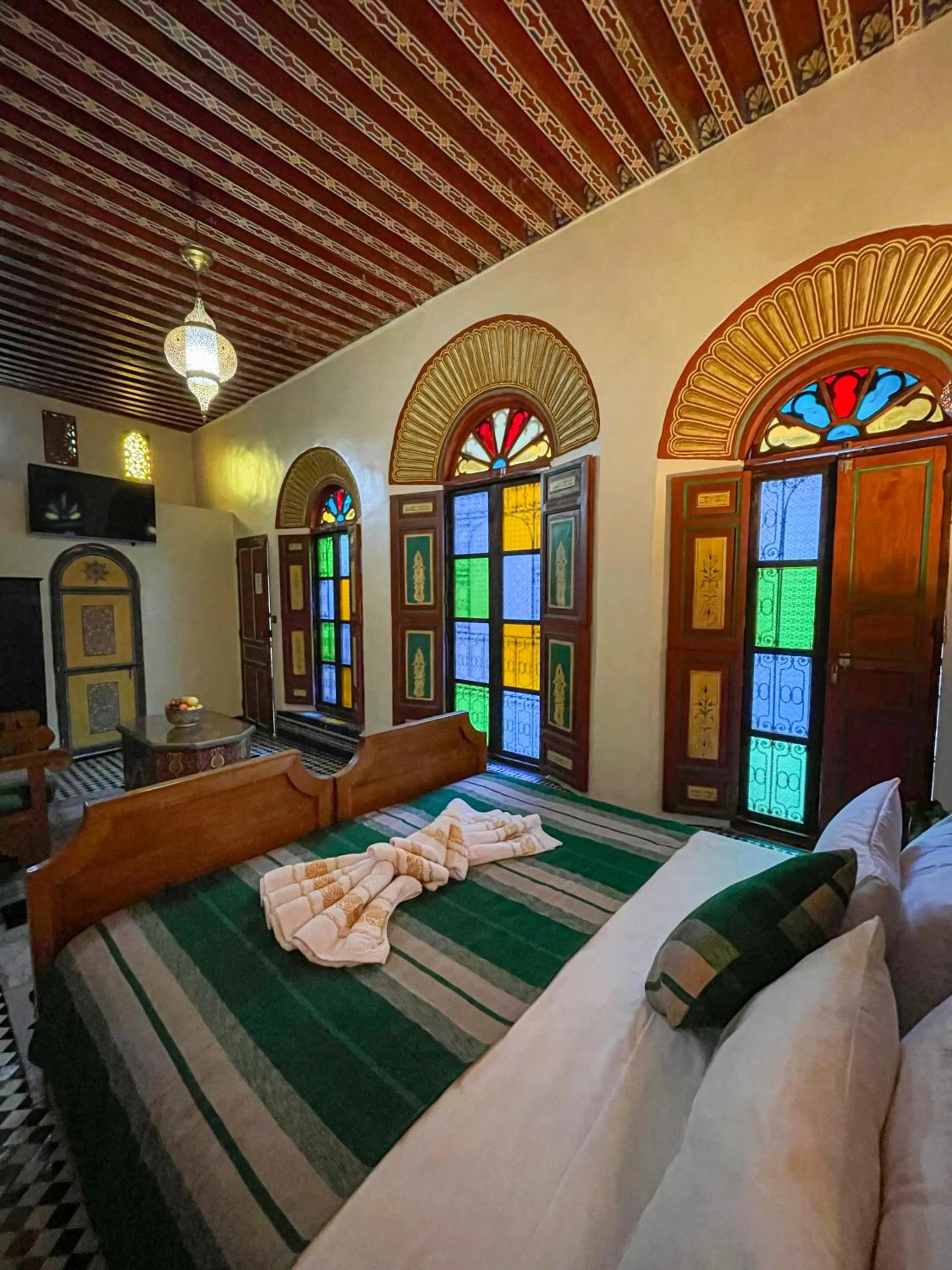 Bed in Riad Dar El Ouedghiri