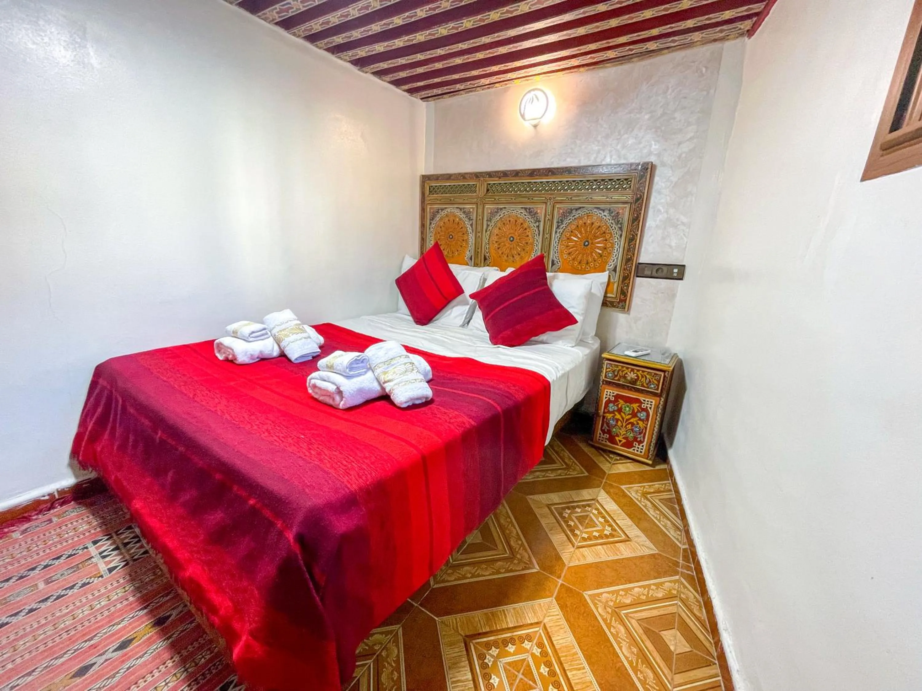 Bed in Riad Dar El Ouedghiri