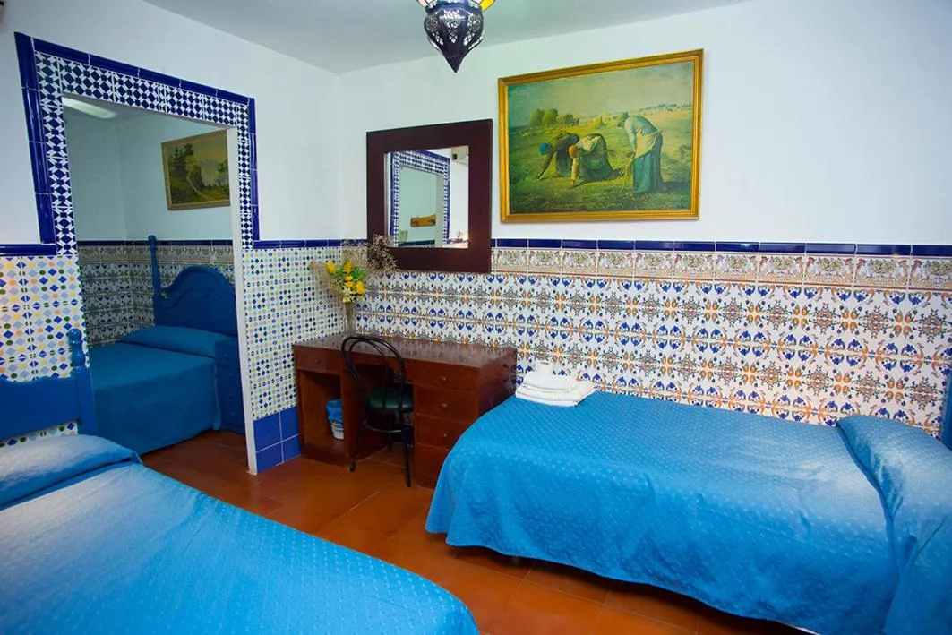 Bed in Pensión Santa María la Blanca