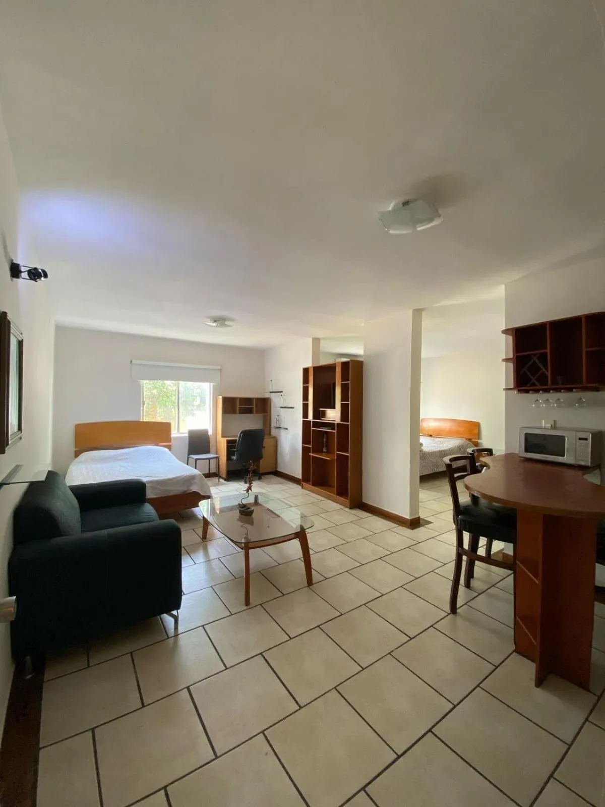 Living room, Bed in Confort Ejecutivo Suites Lindavista