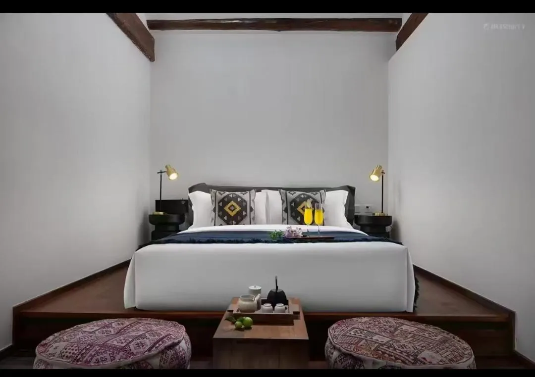 Bed in Peking Yard Boutique Hotel