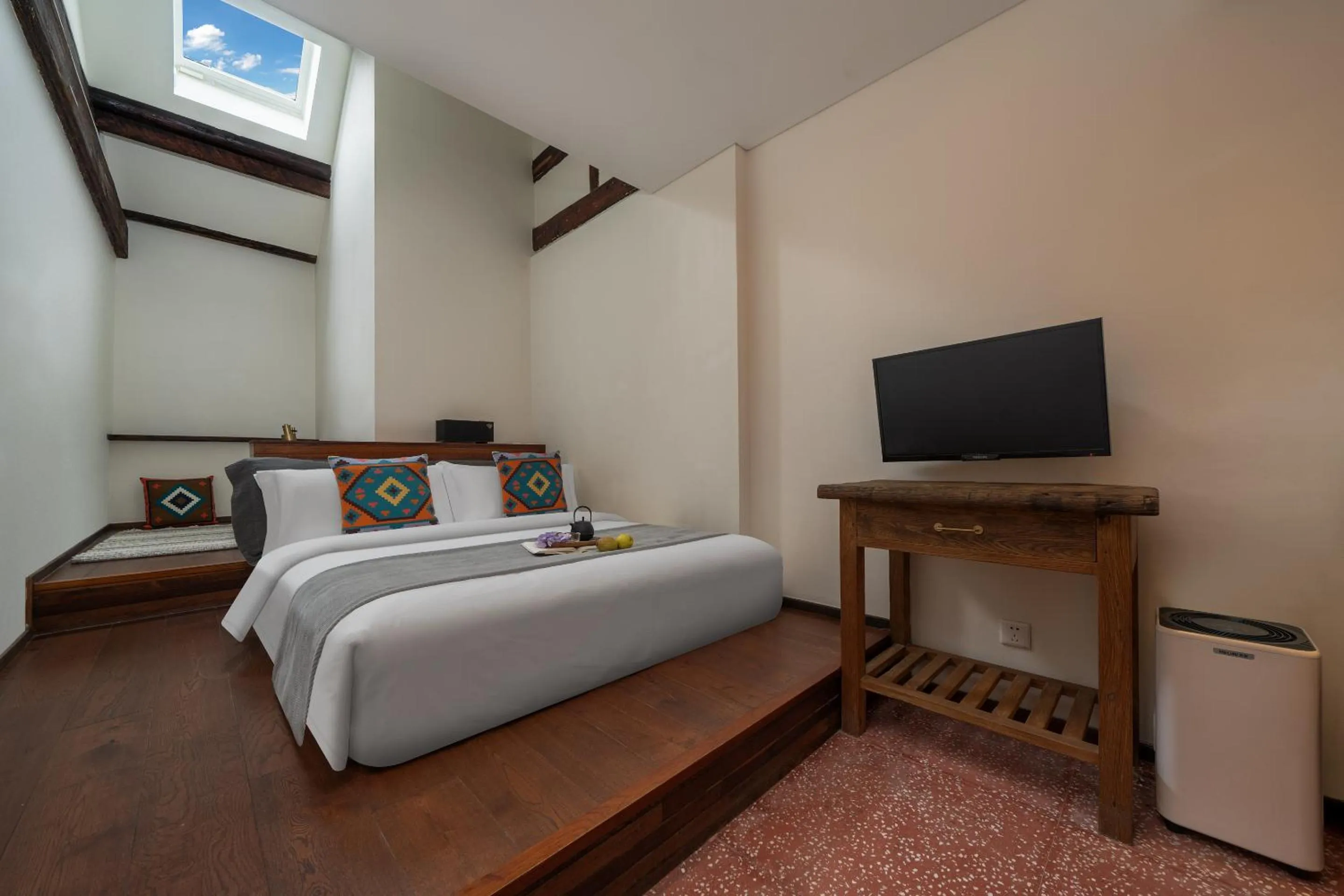 Bed in Peking Yard Boutique Hotel