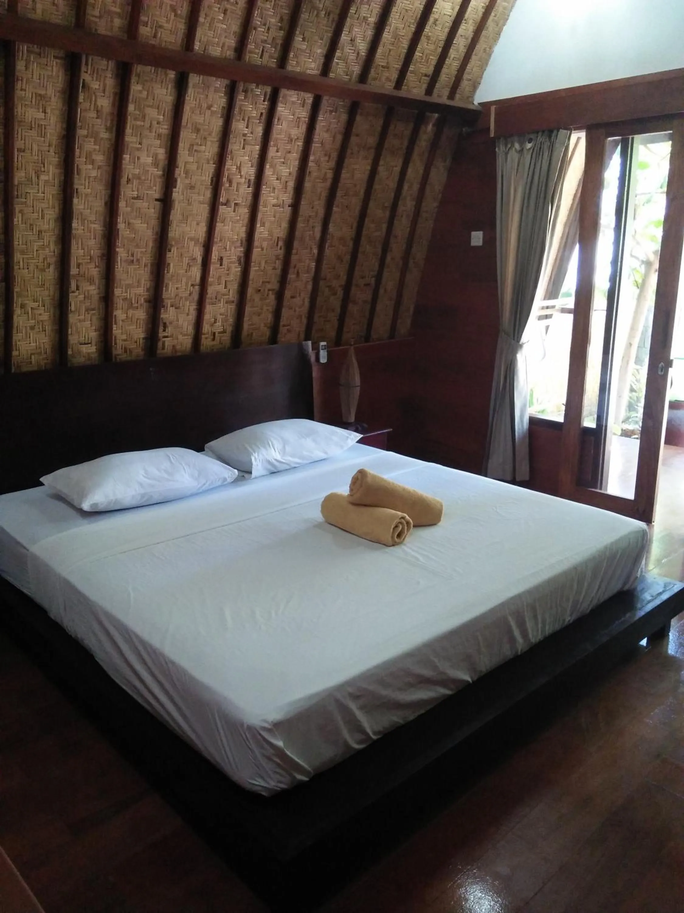 Bed in Gili Smile Bungalow