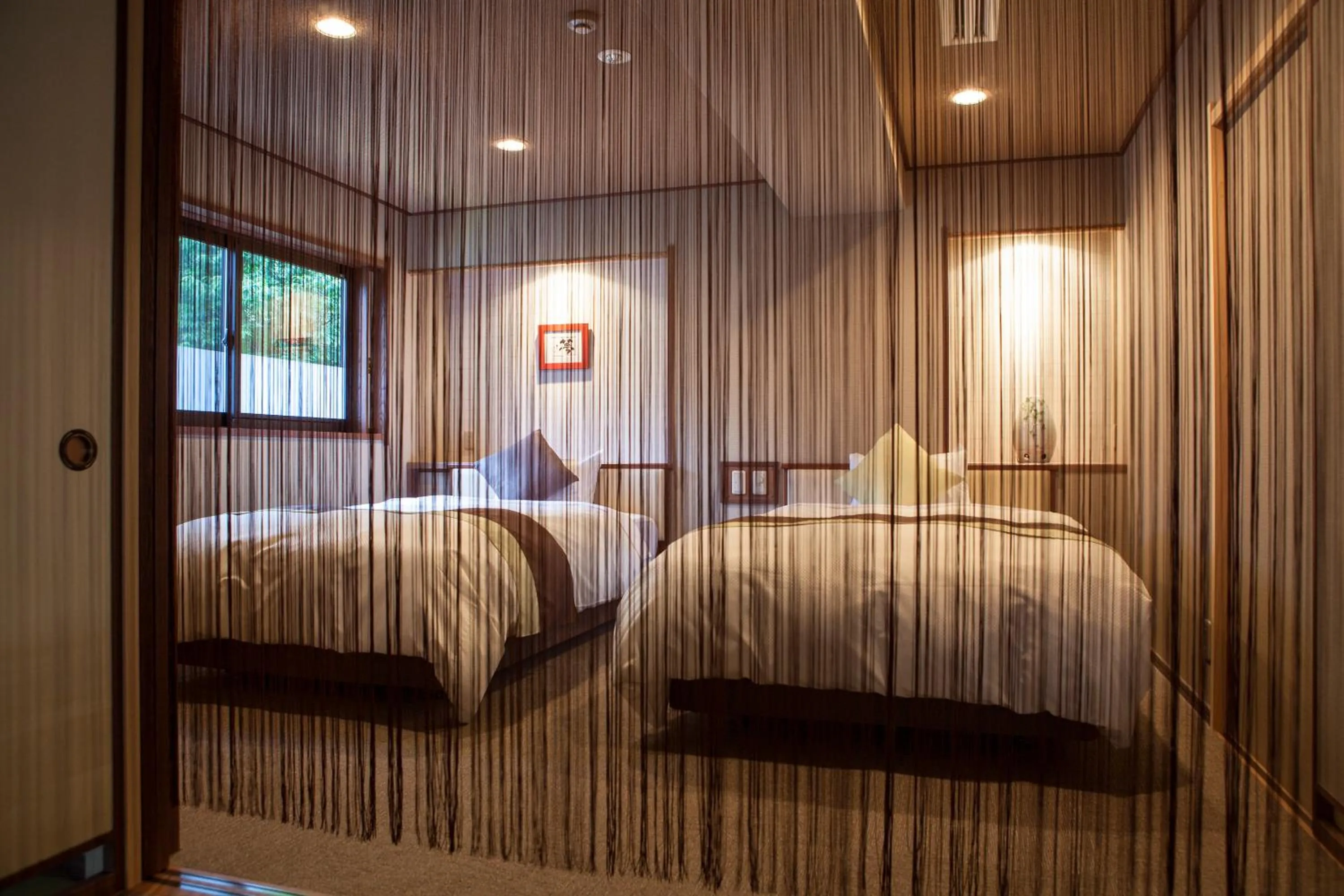 Bed in Hotel Kazurabashi