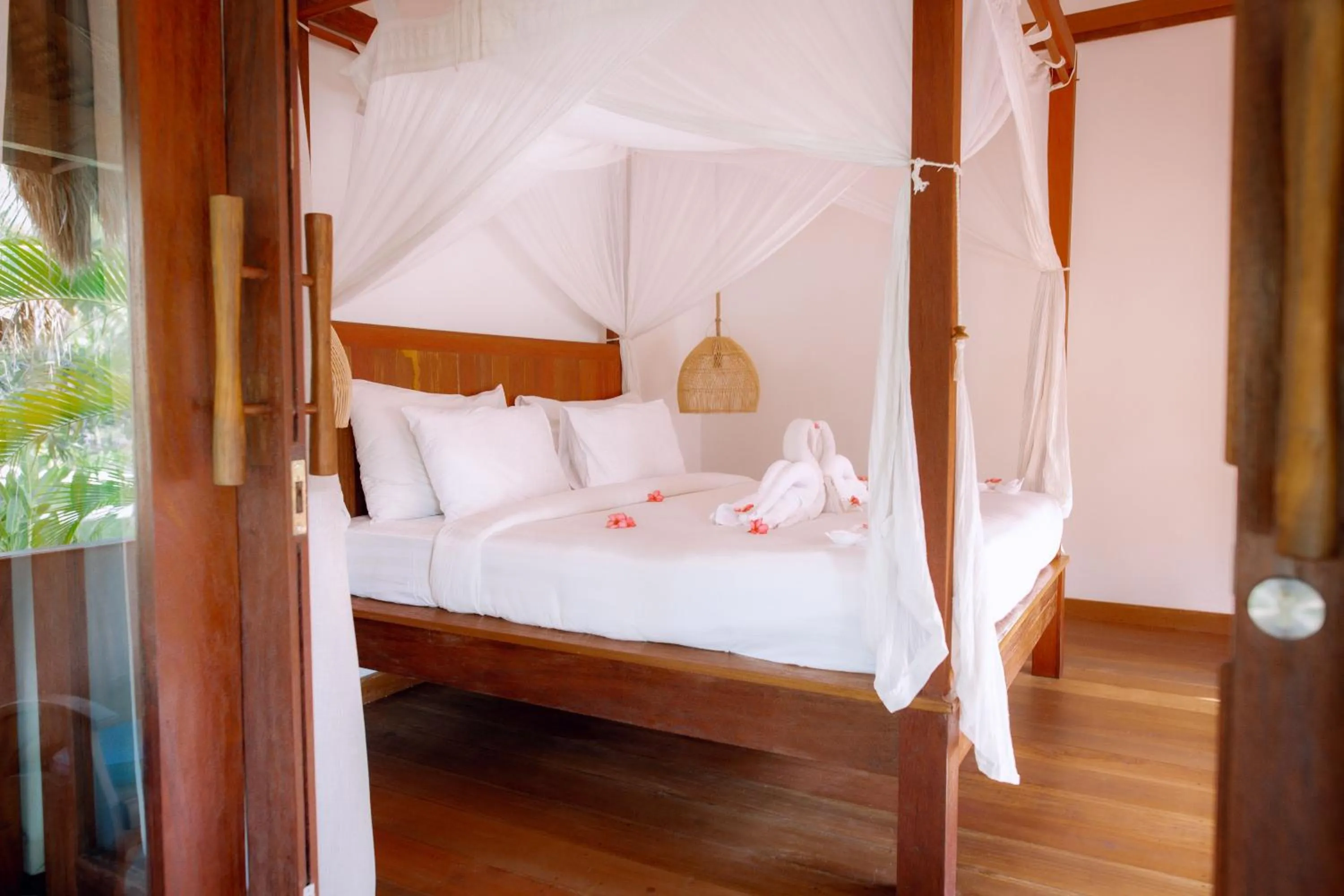 Bed in Island View Bar & Bungalow