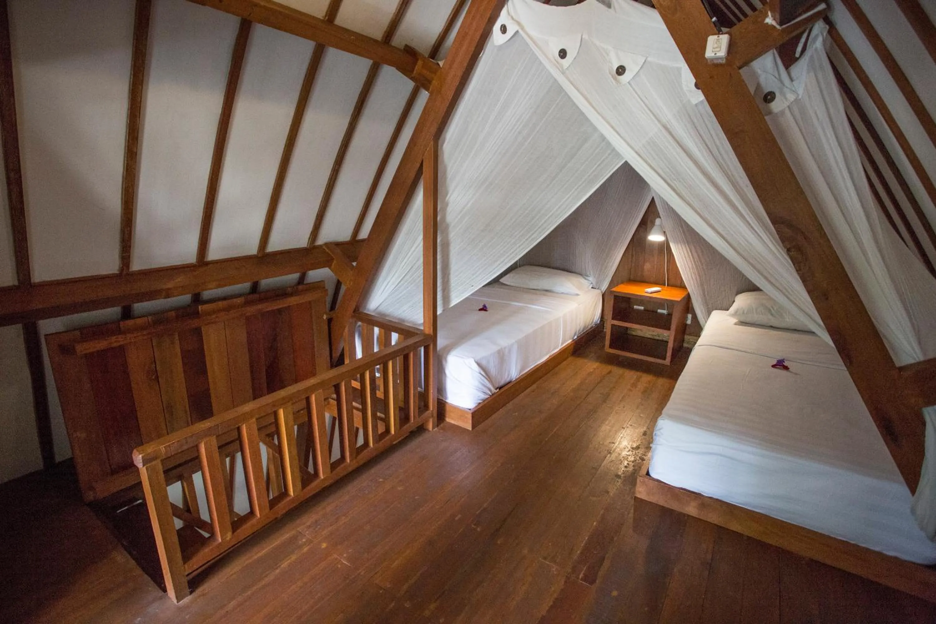 Bed in Island View Bar & Bungalow