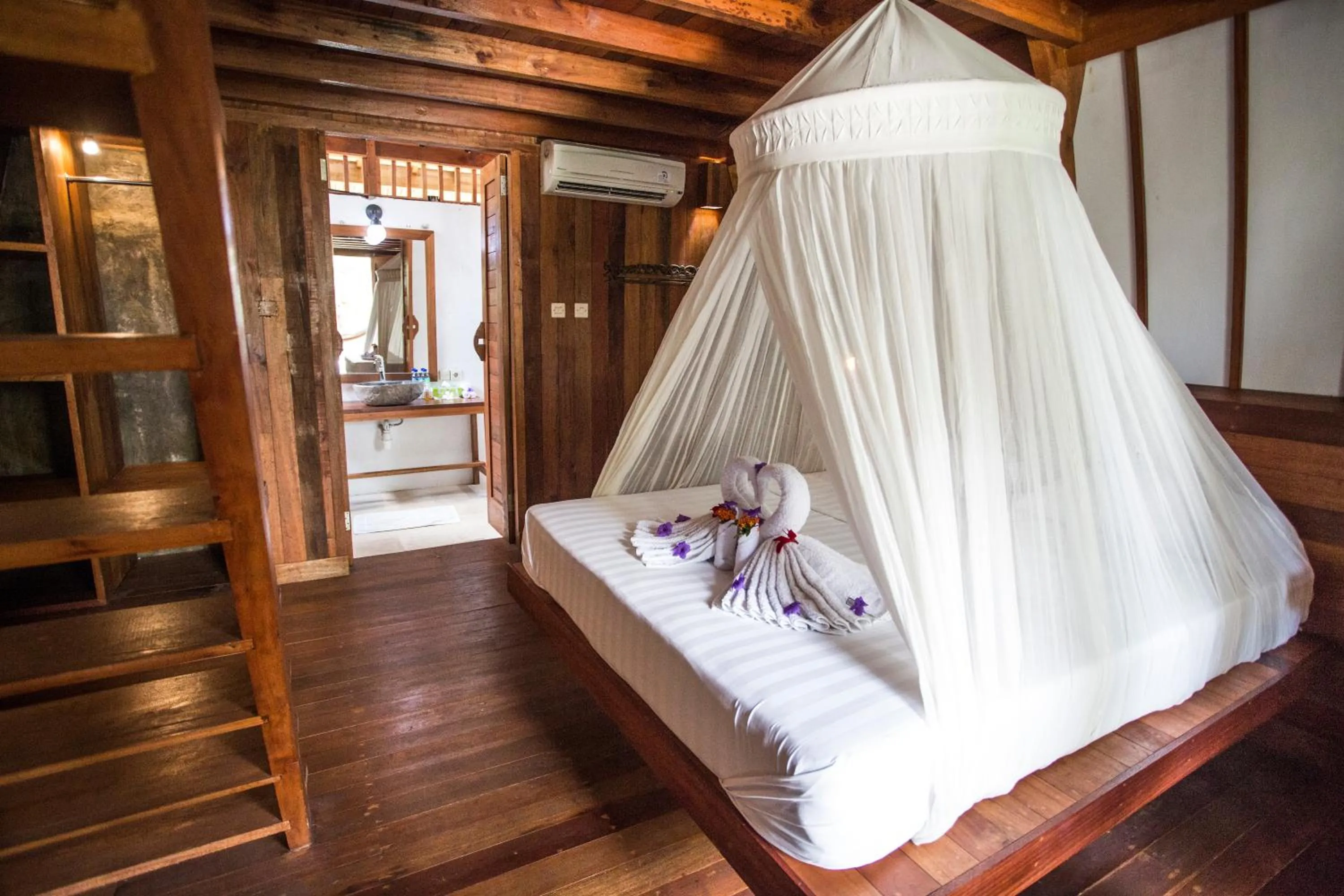 Bed in Island View Bar & Bungalow