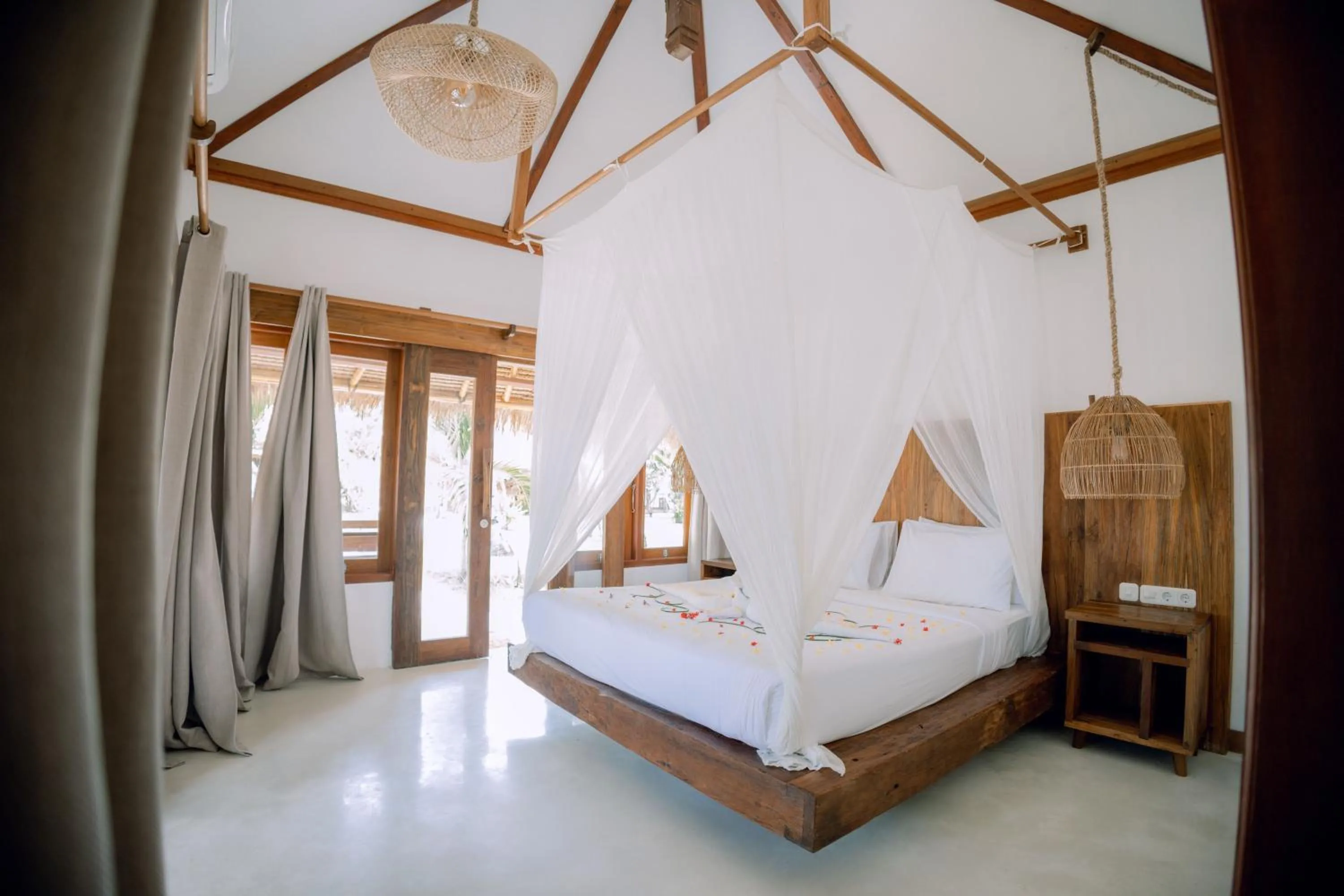 Bed in Island View Bar & Bungalow