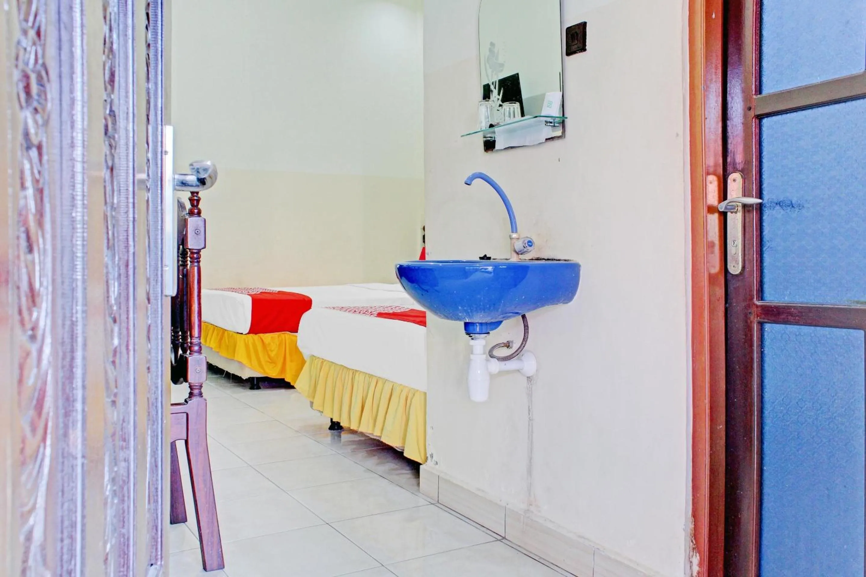 Bedroom in Capital O 90417 Hotel Batu Suli Internasional