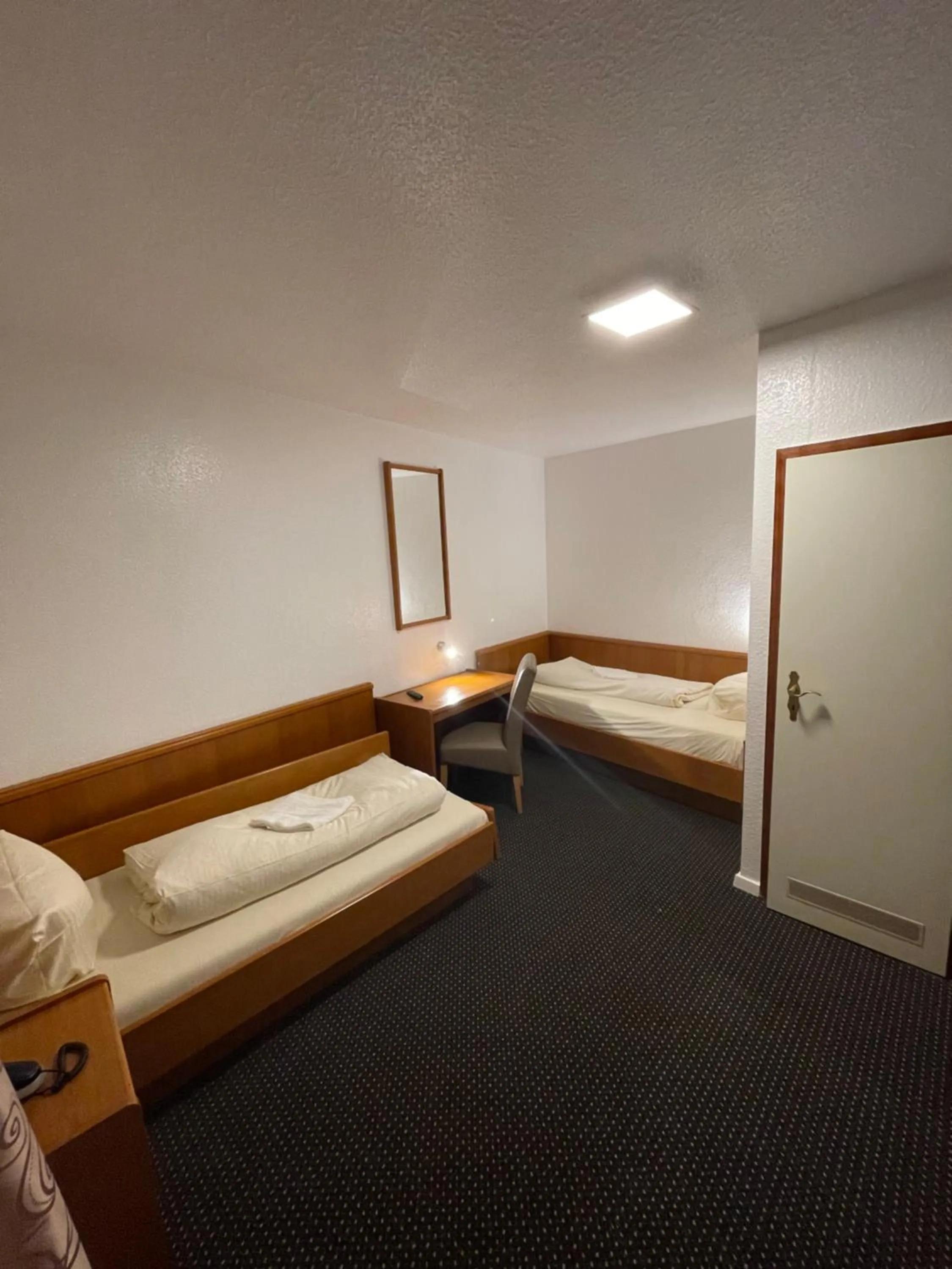 Bed in Brunnen Hotel