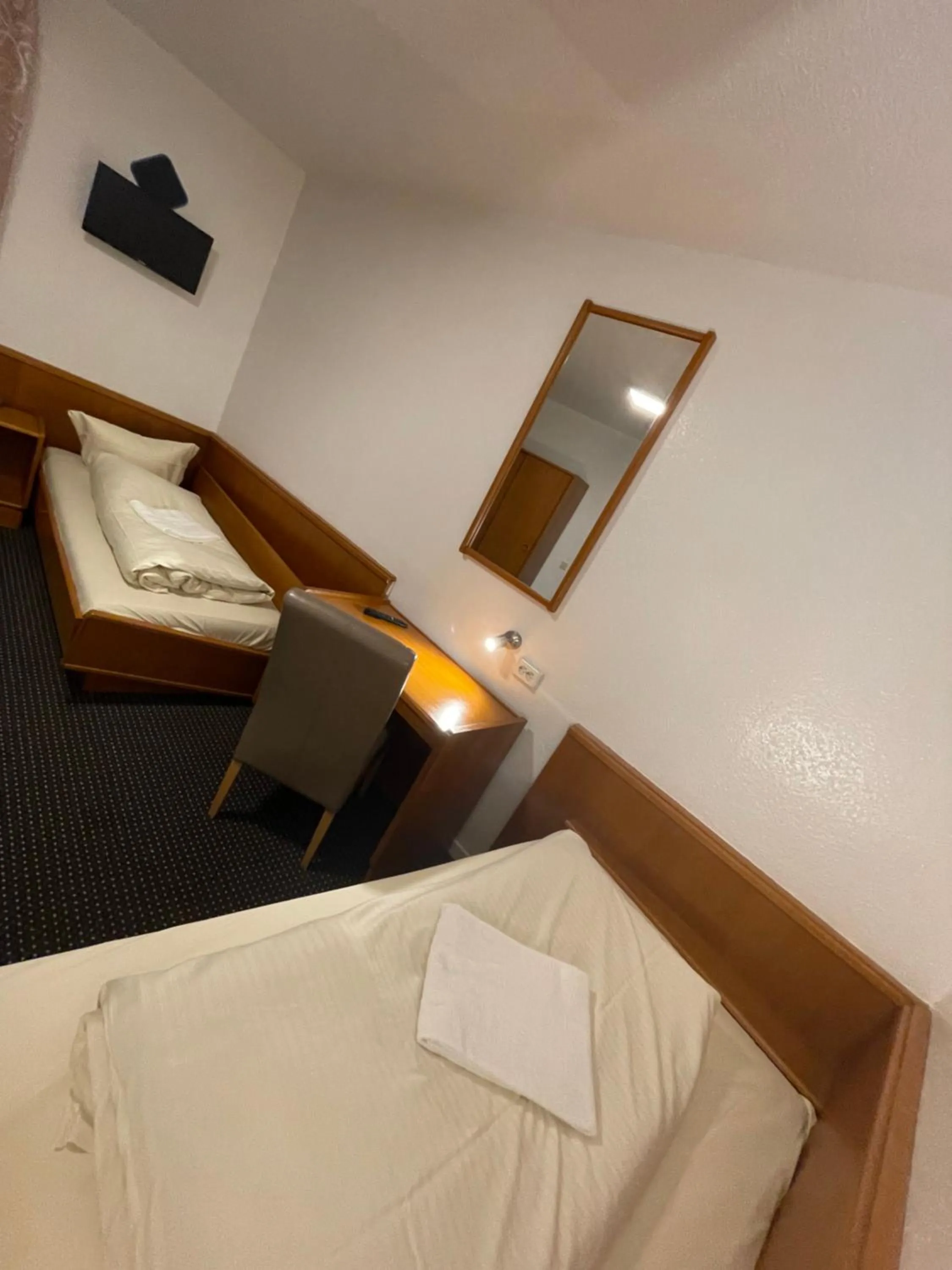 Bed in Brunnen Hotel