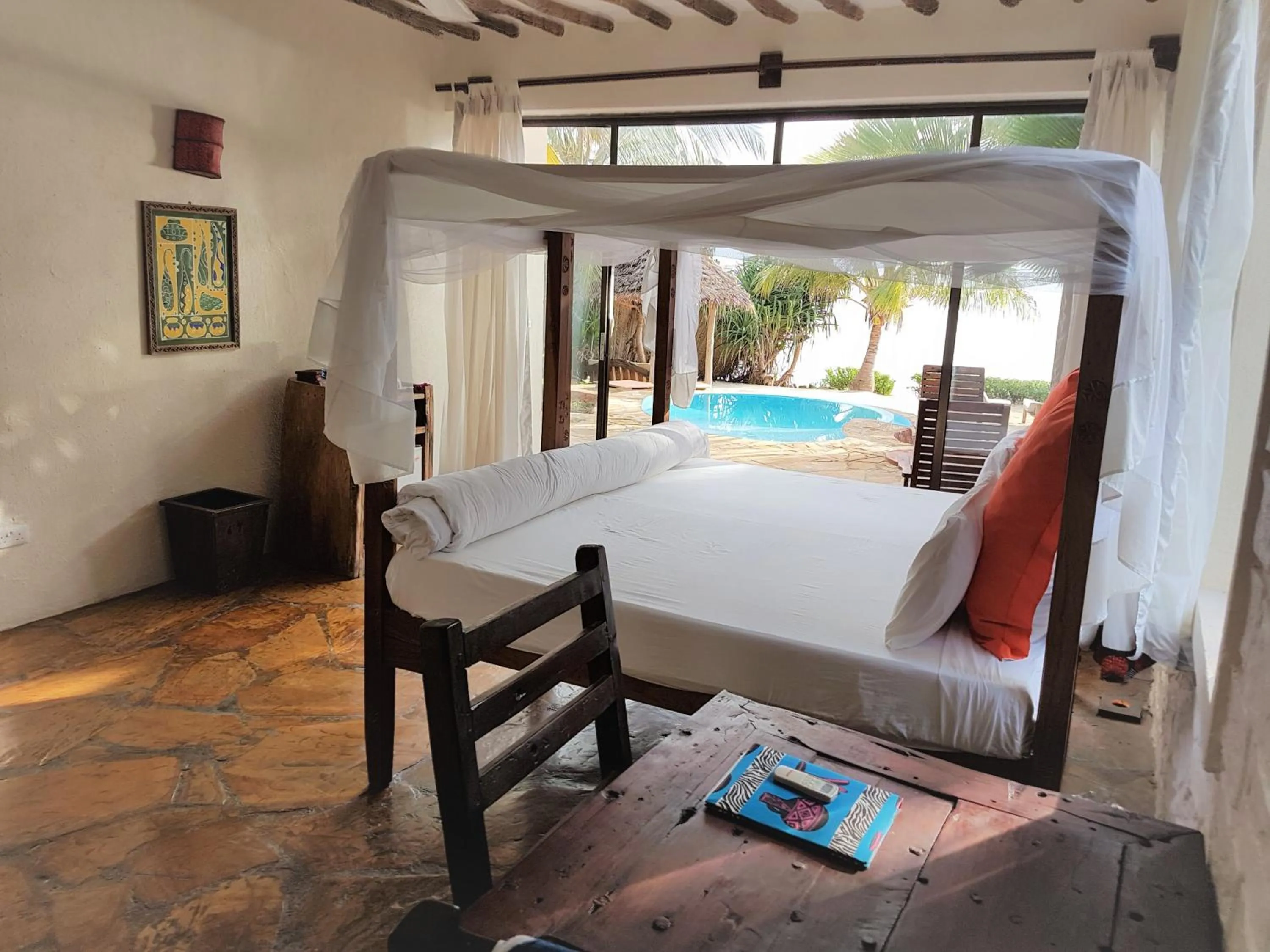 Pool view, Bed in The Zanzibari