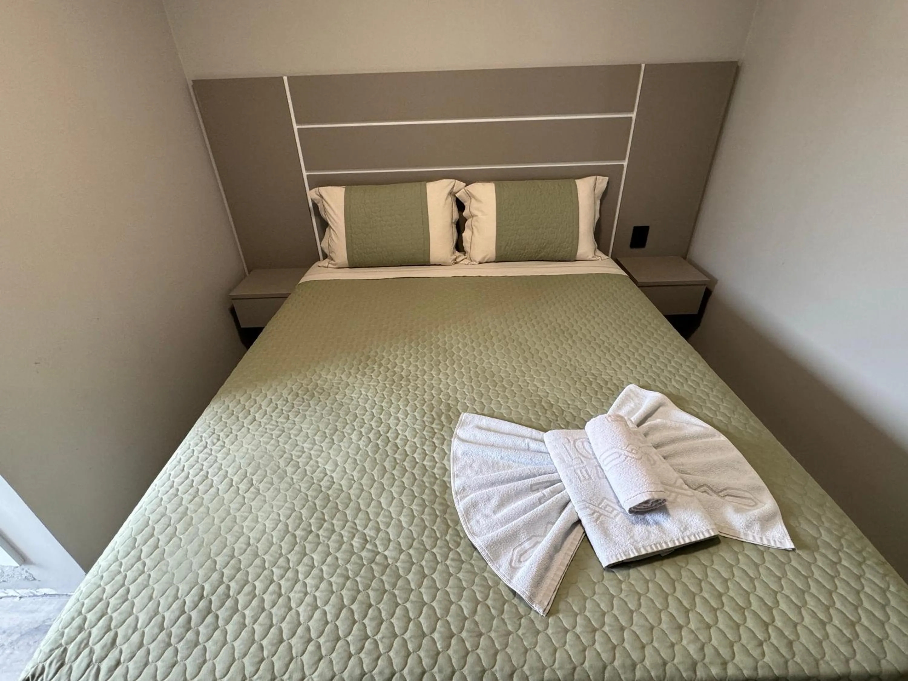 Bed in Shallom Hotel