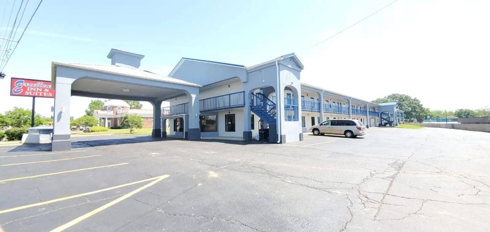 Property building in Excellent Inn & Suites