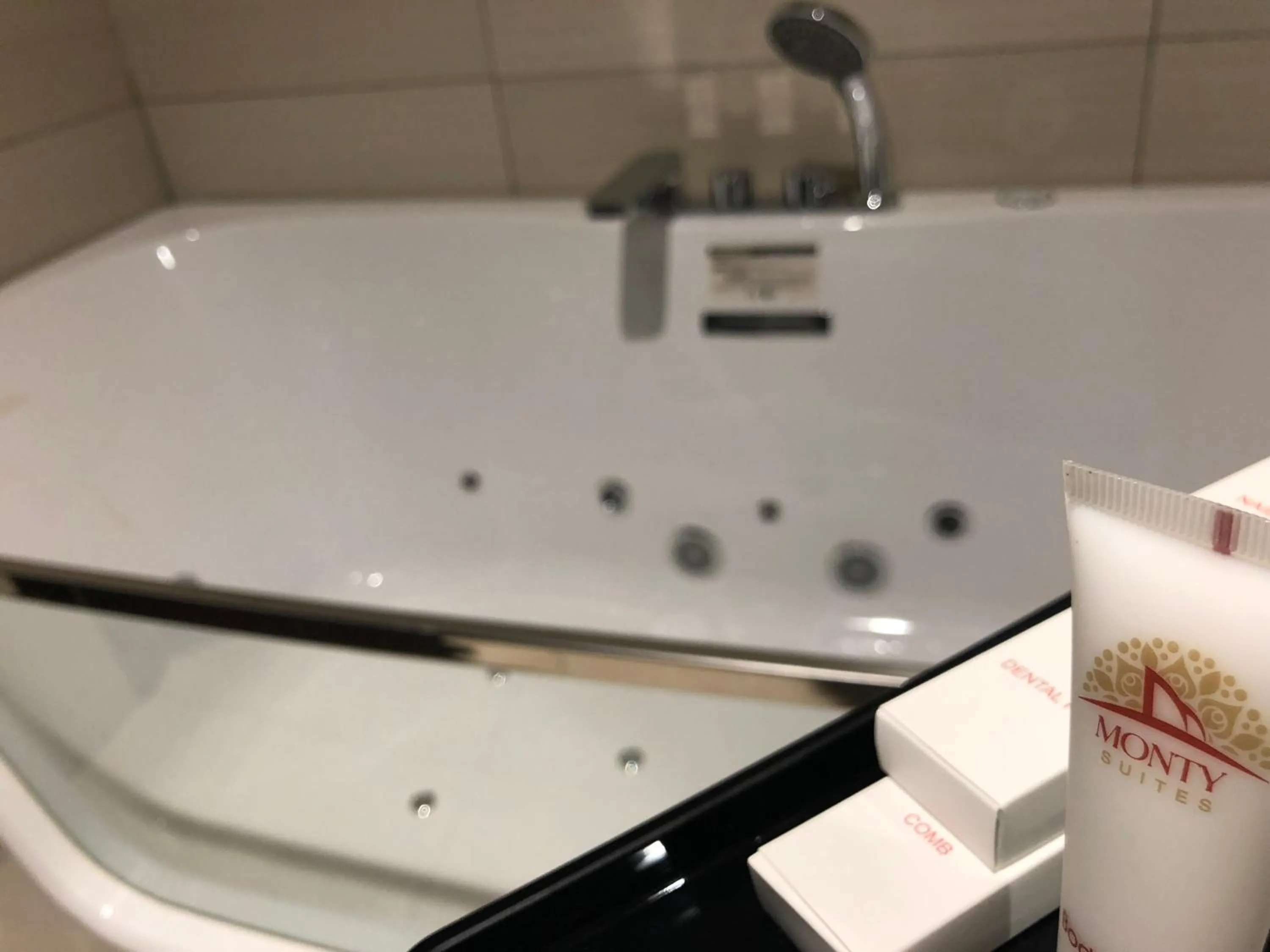 Bathroom in Monty Suites & Golf