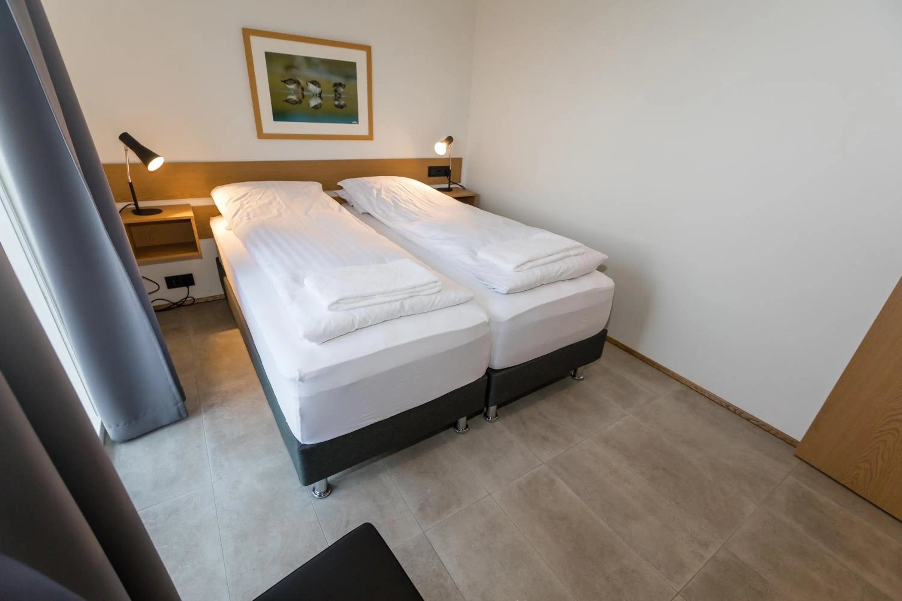 Bed in Hrimland Apartments