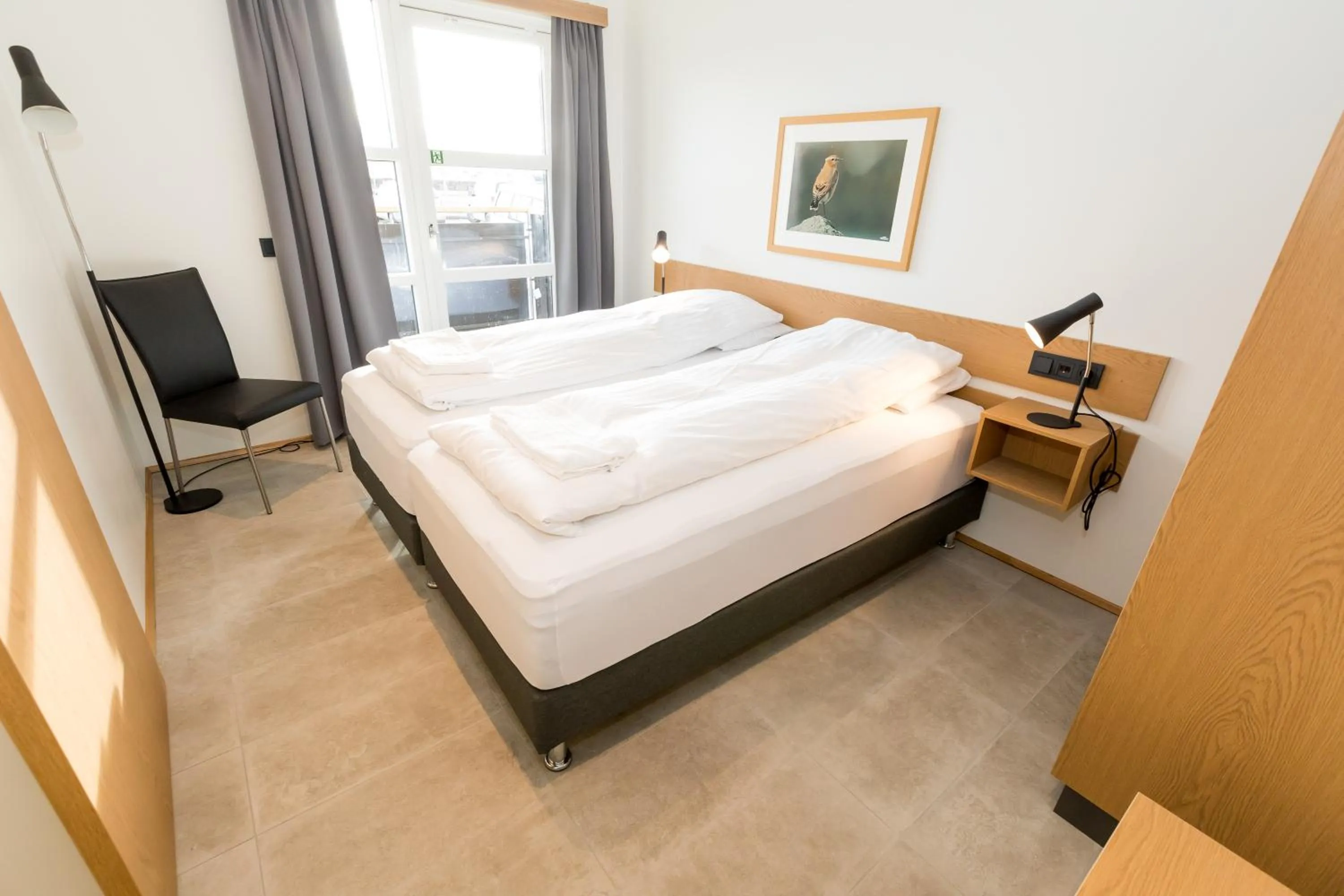 Bed in Hrimland Apartments