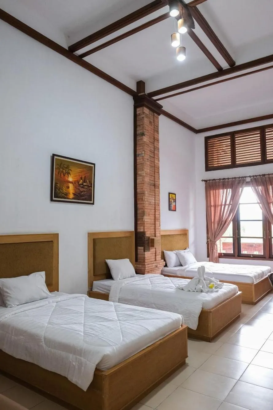 Bed in Jawa Dwipa Heritage Resort