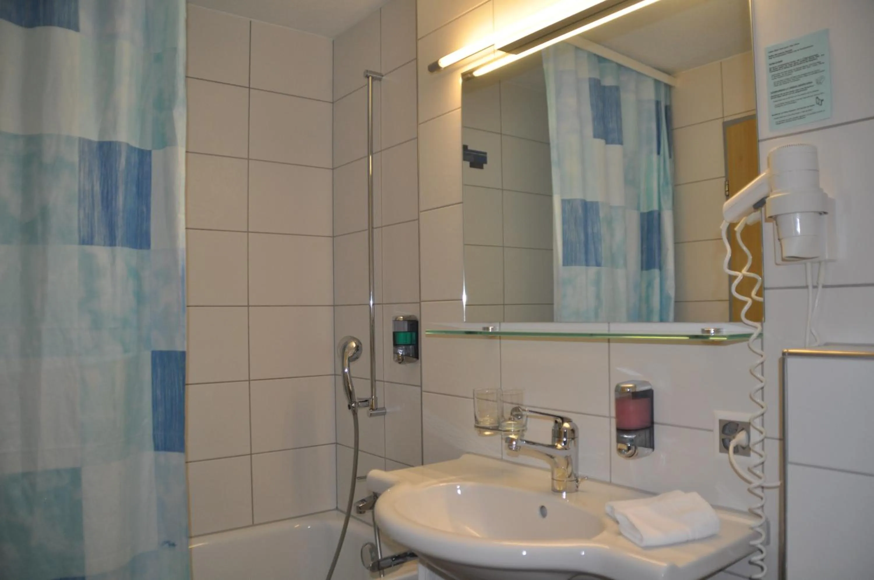 Bathroom in Ferien- und Familienhotel Alpina Adelboden