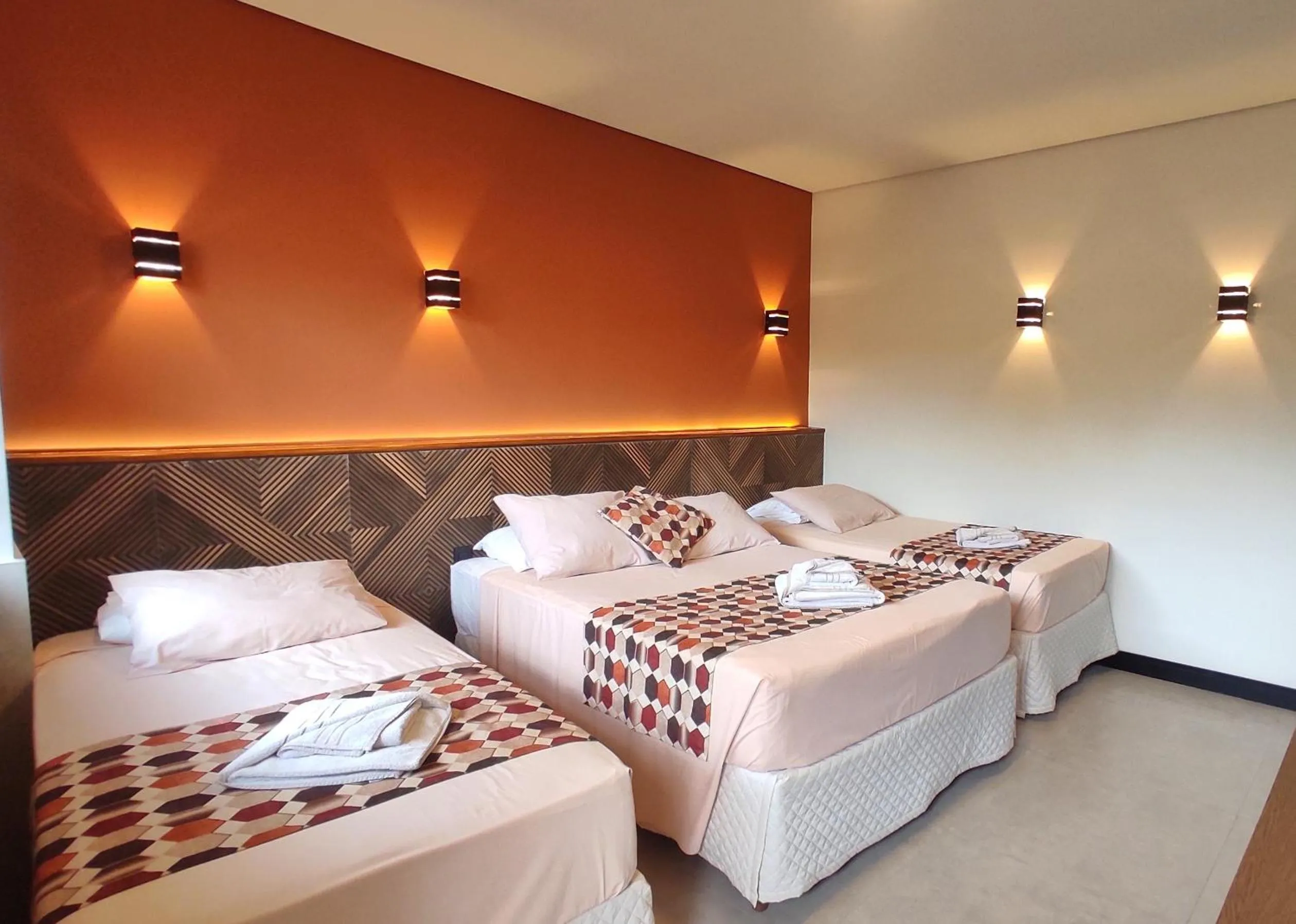 Bed in Pousada Novo Prado