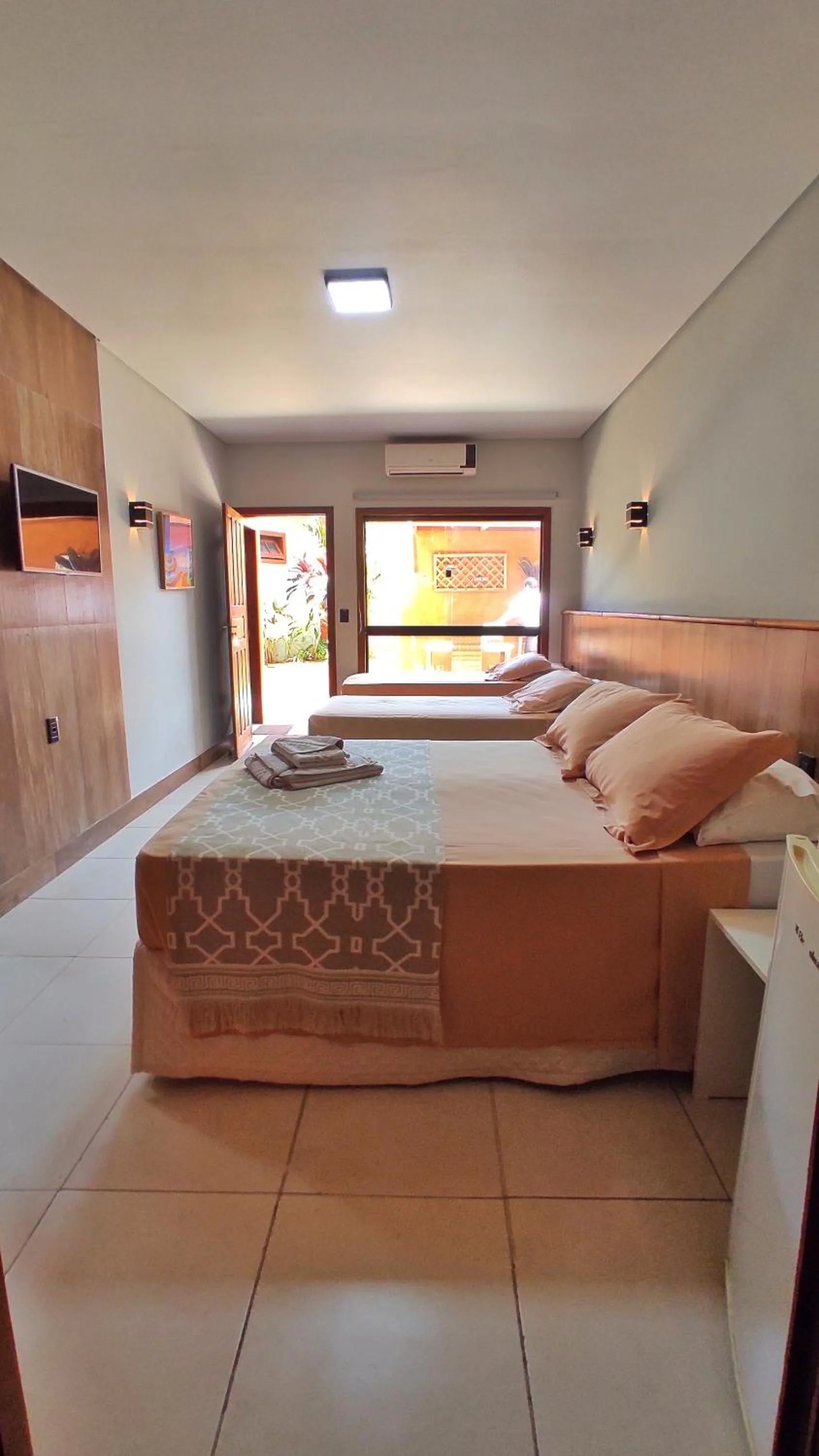 Bed in Pousada Novo Prado