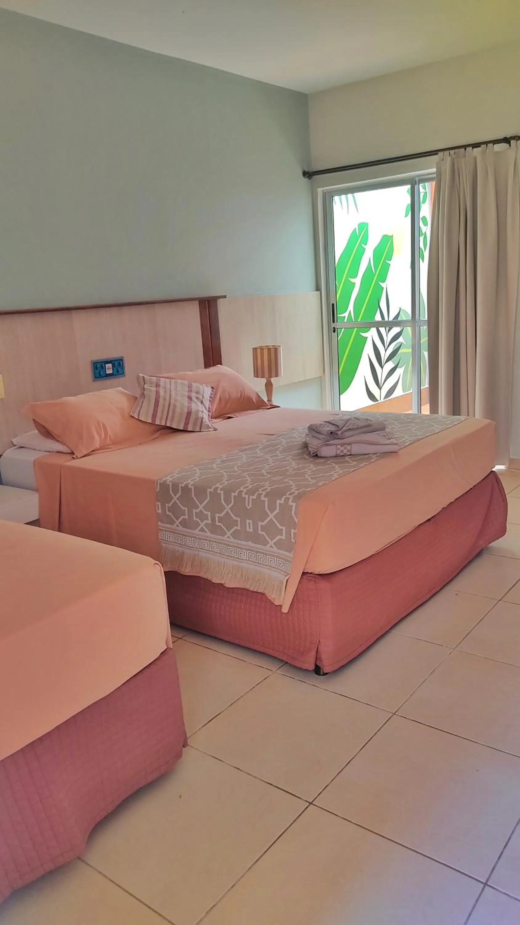 Bed in Pousada Novo Prado