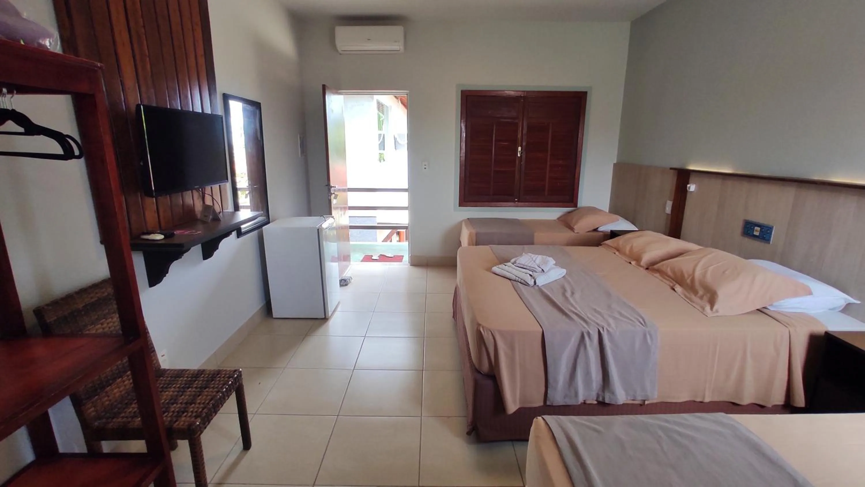 Bed in Pousada Novo Prado