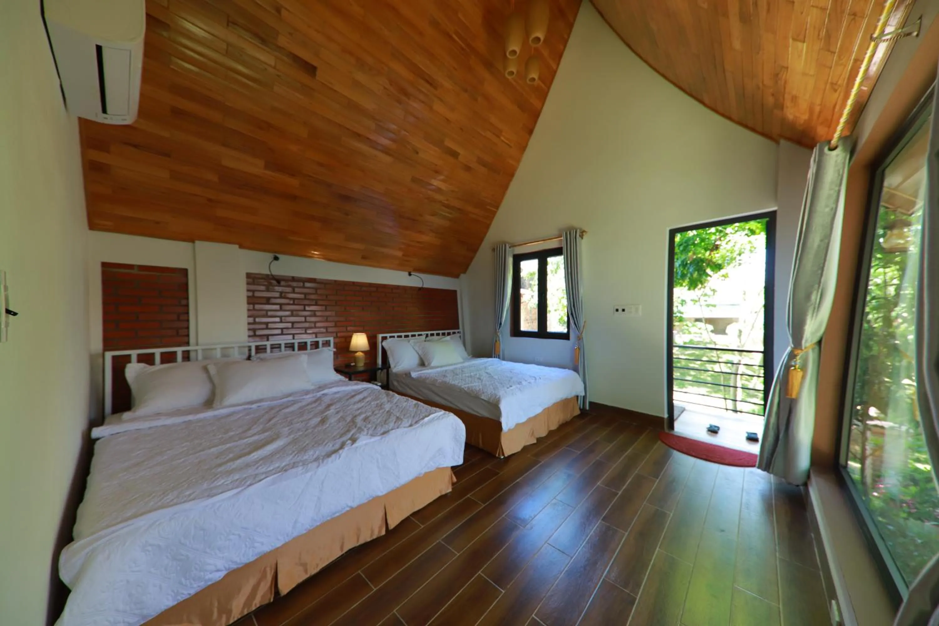 Bedroom, Bed in Tropical Valley Homestay - Villas