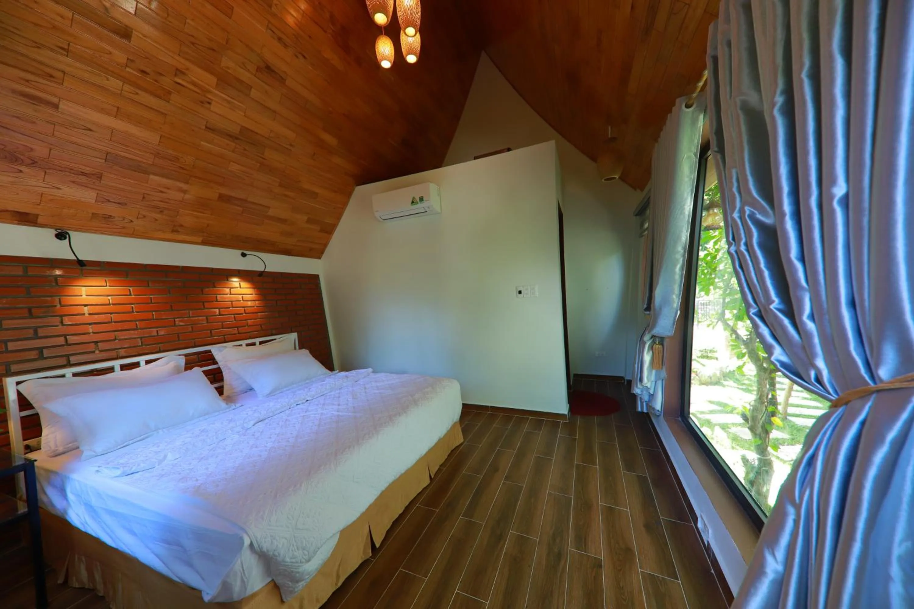 Bedroom, Bed in Tropical Valley Homestay - Villas