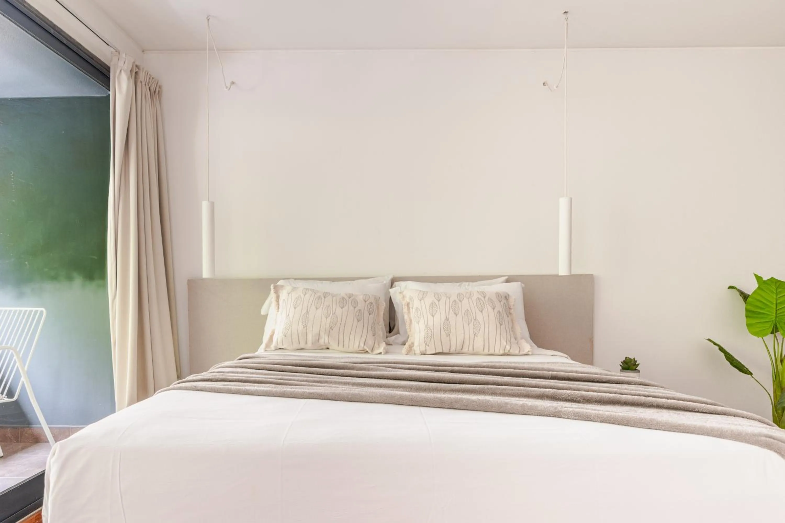 Bed in Departamentos Lugar