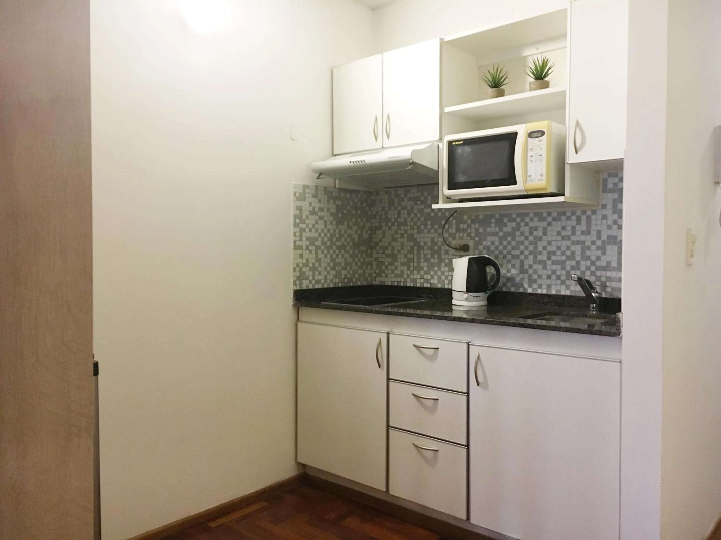 Kitchen or kitchenette in Departamentos Lugar
