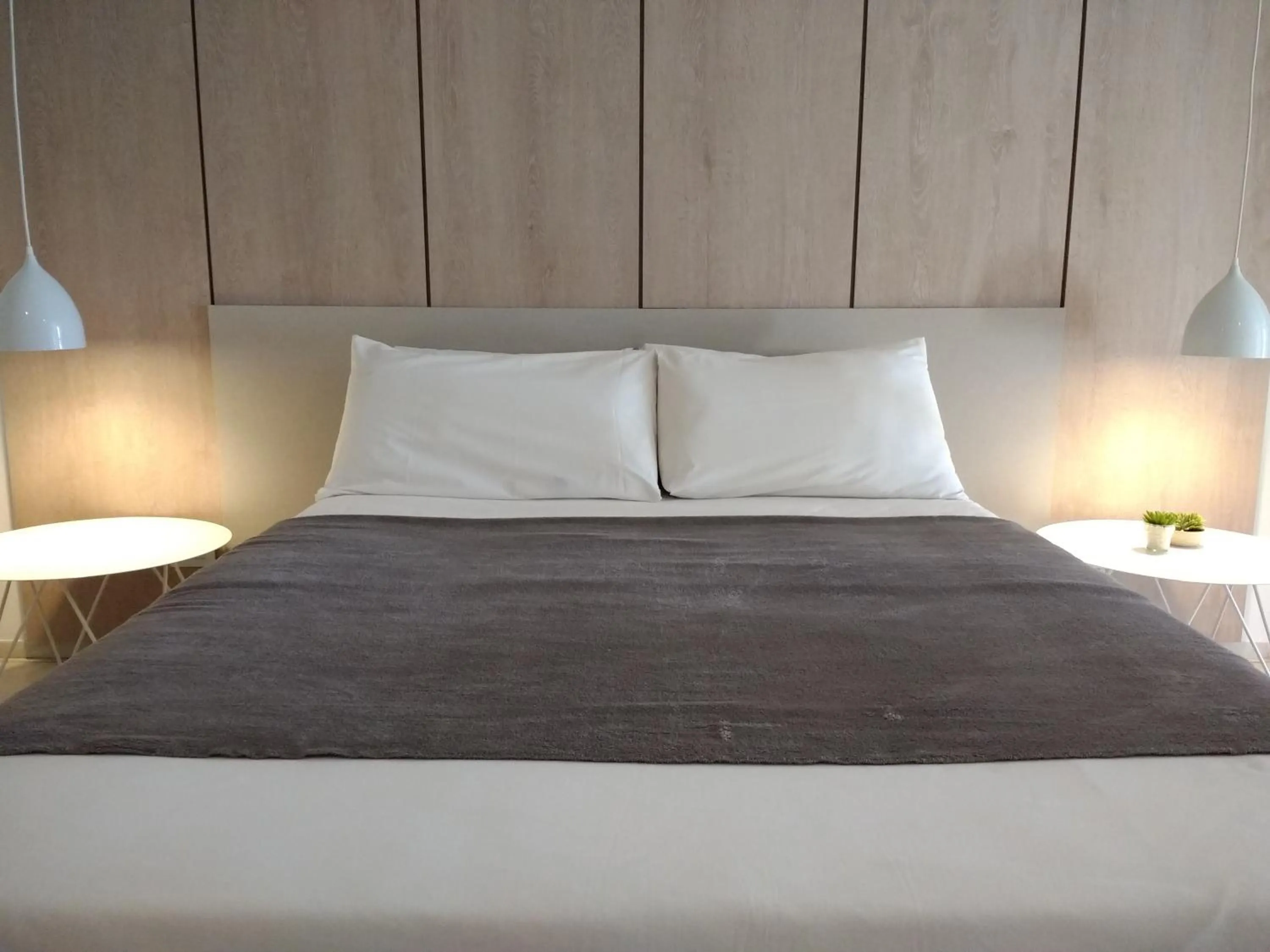 Bed in Departamentos Lugar