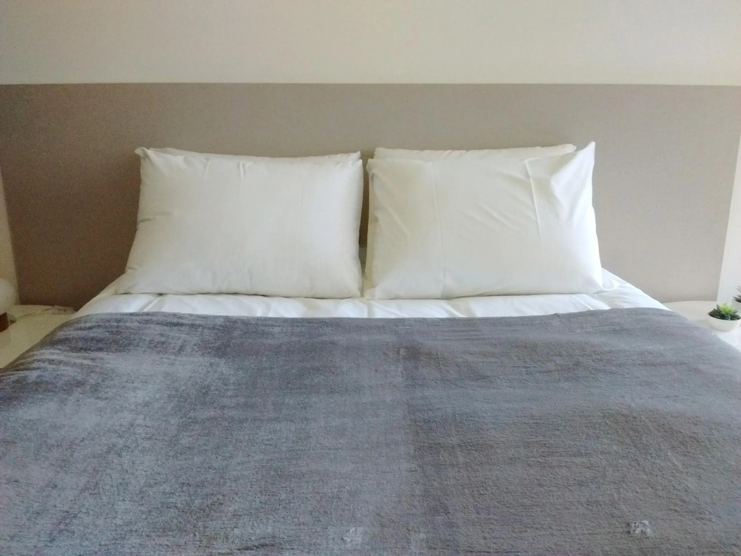 Bed in Departamentos Lugar