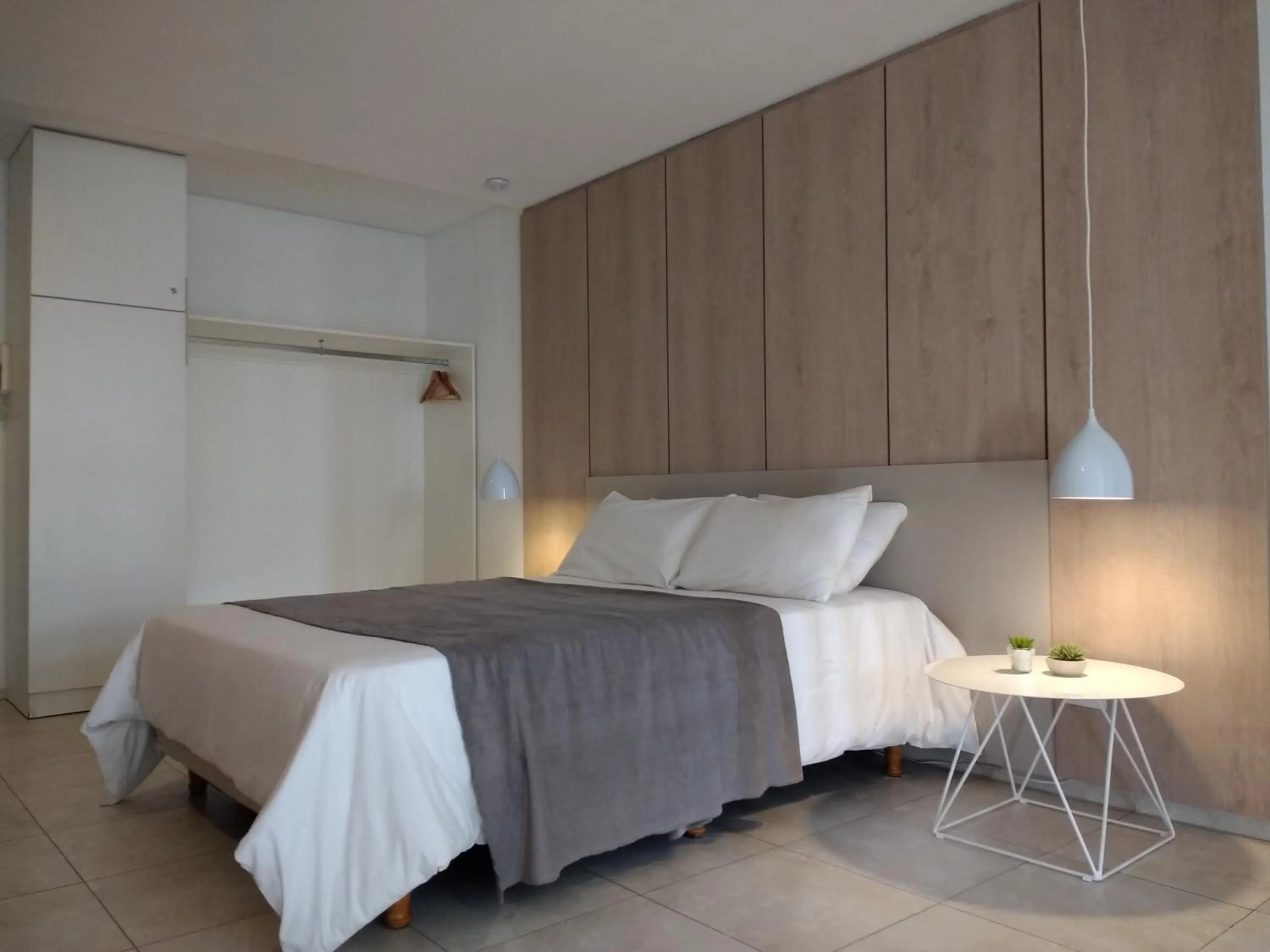 Bedroom, Bed in Departamentos Lugar